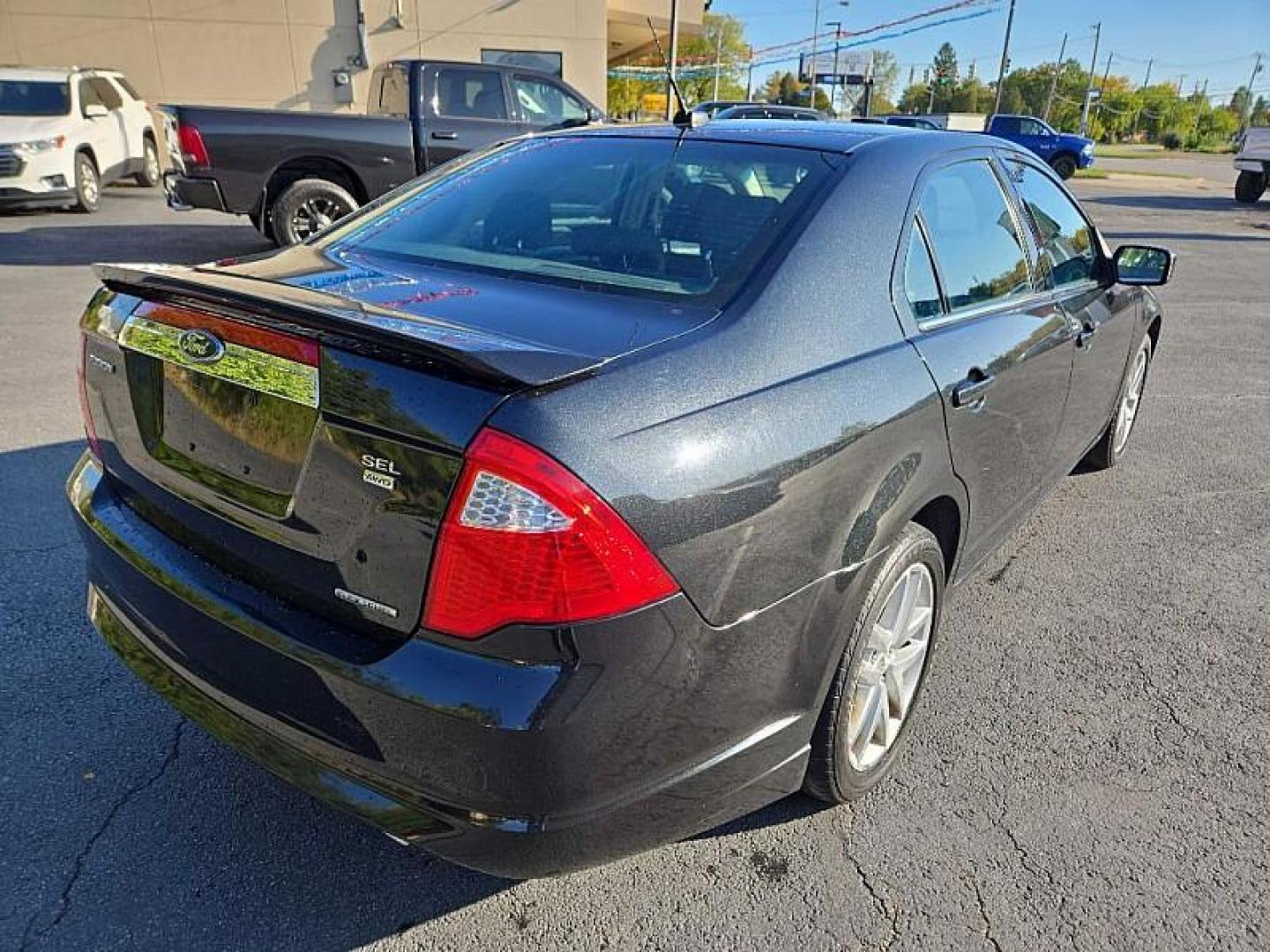 2012 BLACK /BLACK Ford Fusion SEL AWD (3FAHP0CG6CR) with an 3.0L V6 DOHC 24V engine, Automatic 6-Spd w/SelectShift transmission, located at 3304 Woodville Road, Northwood, OH, 43619, (419) 210-8019, 41.612694, -83.480743 - We are #1 Auto Loan Dealer for Good Bad or No Credit we have hundreds of vehicles to choose from, stop on in or just fill out our online application to get approved for auto financing and see your credit score for free by visiting our website today. We have Low Payment Options and Terms Available - Photo#10