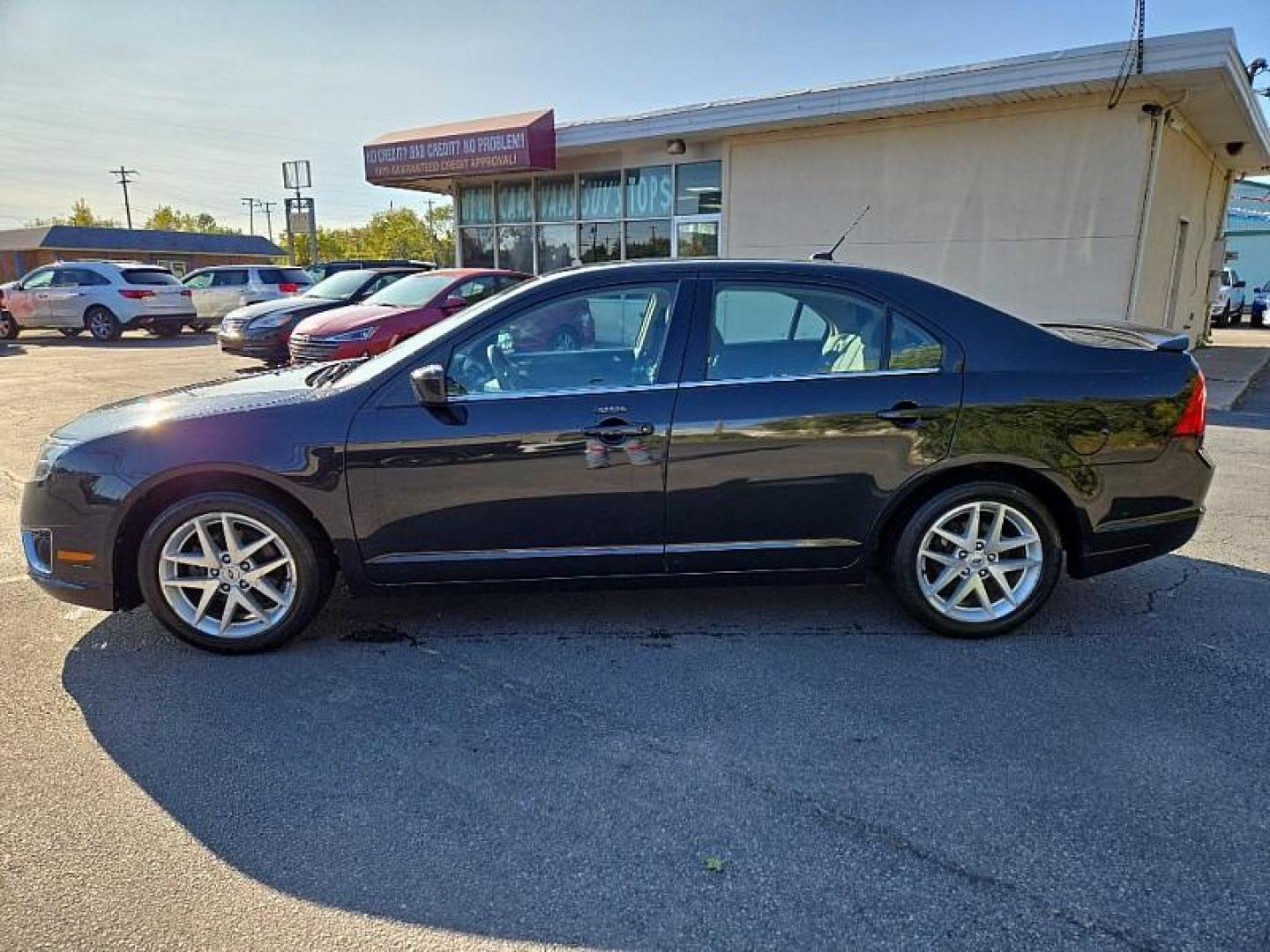 2012 BLACK /BLACK Ford Fusion SEL AWD (3FAHP0CG6CR) with an 3.0L V6 DOHC 24V engine, Automatic 6-Spd w/SelectShift transmission, located at 3304 Woodville Road, Northwood, OH, 43619, (419) 210-8019, 41.612694, -83.480743 - We are #1 Auto Loan Dealer for Good Bad or No Credit we have hundreds of vehicles to choose from, stop on in or just fill out our online application to get approved for auto financing and see your credit score for free by visiting our website today. We have Low Payment Options and Terms Available - Photo#2