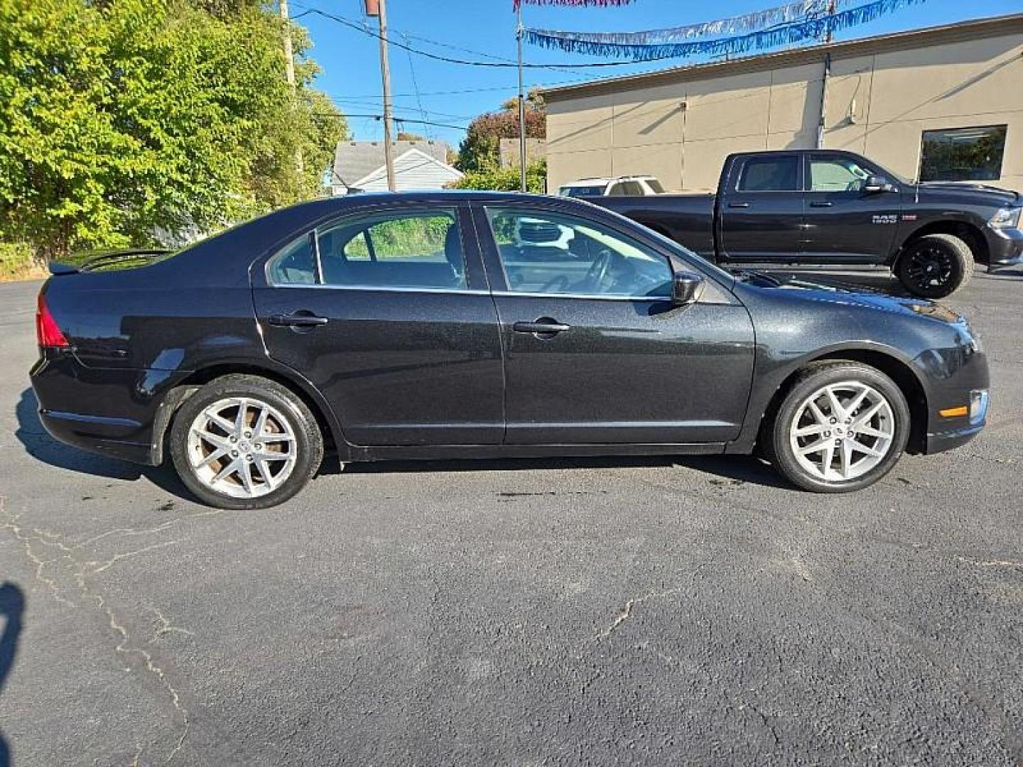 2012 BLACK /BLACK Ford Fusion SEL AWD (3FAHP0CG6CR) with an 3.0L V6 DOHC 24V engine, Automatic 6-Spd w/SelectShift transmission, located at 3304 Woodville Road, Northwood, OH, 43619, (419) 210-8019, 41.612694, -83.480743 - We are #1 Auto Loan Dealer for Good Bad or No Credit we have hundreds of vehicles to choose from, stop on in or just fill out our online application to get approved for auto financing and see your credit score for free by visiting our website today. We have Low Payment Options and Terms Available - Photo#4