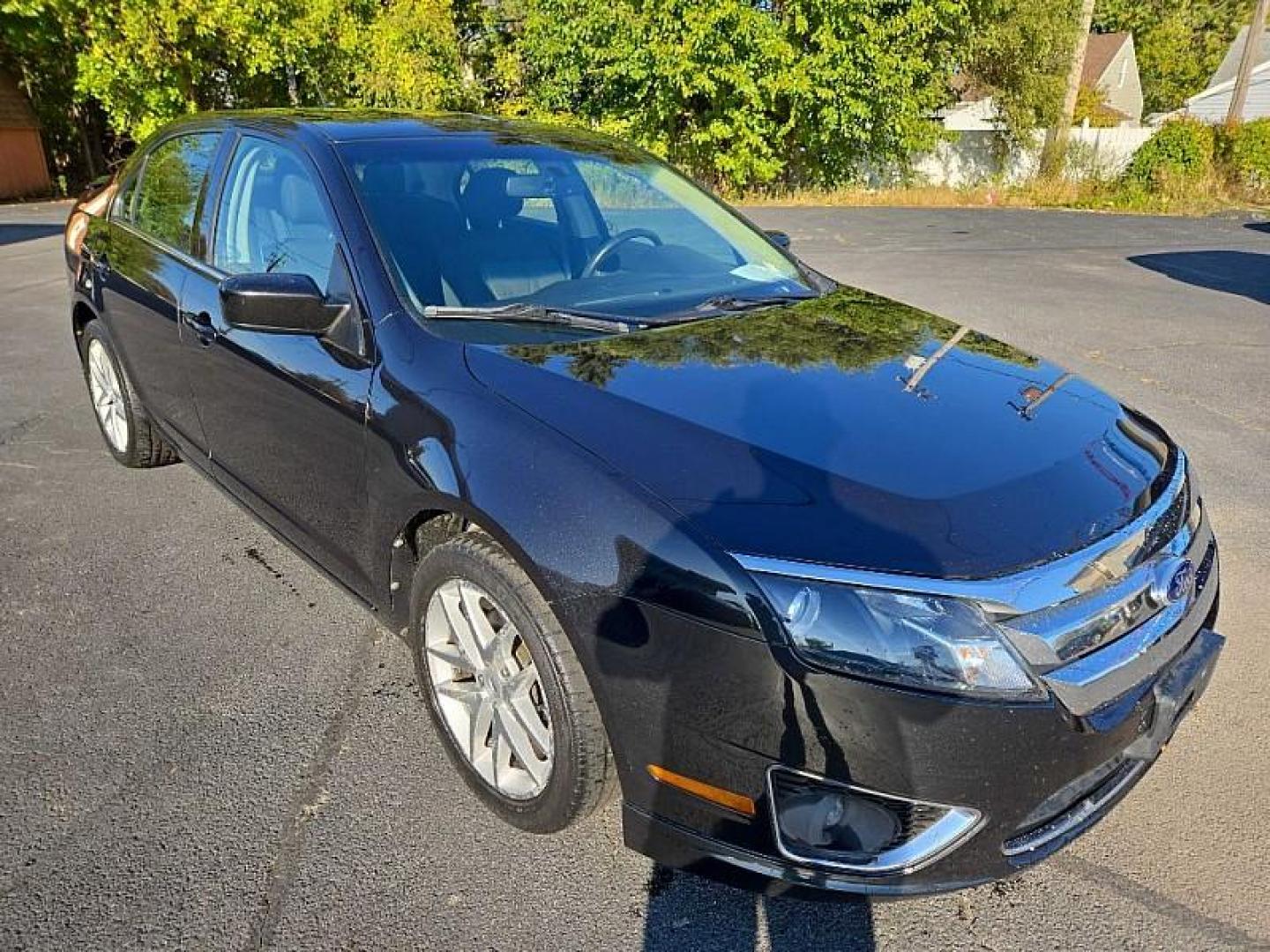 2012 BLACK /BLACK Ford Fusion SEL AWD (3FAHP0CG6CR) with an 3.0L V6 DOHC 24V engine, Automatic 6-Spd w/SelectShift transmission, located at 3304 Woodville Road, Northwood, OH, 43619, (419) 210-8019, 41.612694, -83.480743 - We are #1 Auto Loan Dealer for Good Bad or No Credit we have hundreds of vehicles to choose from, stop on in or just fill out our online application to get approved for auto financing and see your credit score for free by visiting our website today. We have Low Payment Options and Terms Available - Photo#5