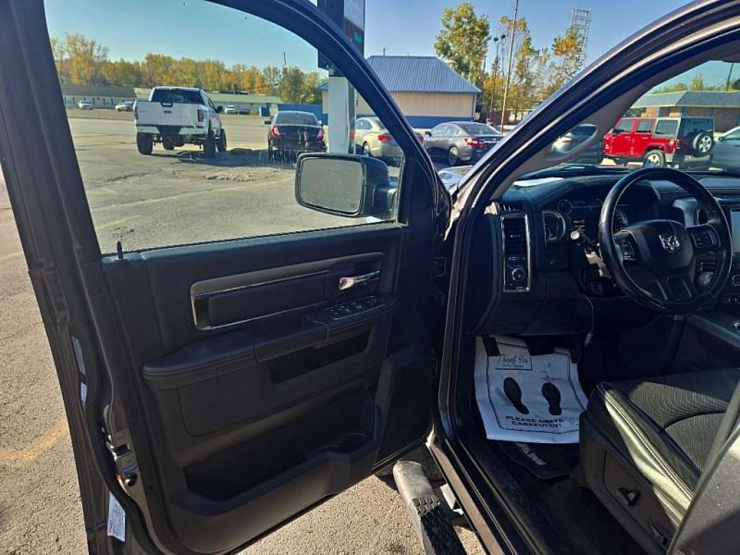 2017 GREY /BLACK RAM 1500 Sport Quad Cab 4WD (1C6RR7HT9HS) with an 5.7L V8 OHV 16V engine, 8A transmission, located at 3304 Woodville Road, Northwood, OH, 43619, (419) 210-8019, 41.612694, -83.480743 - We are #1 Auto Loan Dealer for Good Bad or No Credit we have hundreds of vehicles to choose from, stop on in or just fill out our online application to get approved for auto financing and see your credit score for free by visiting our website today. We have Low Payment Options and Terms Available - Photo#8