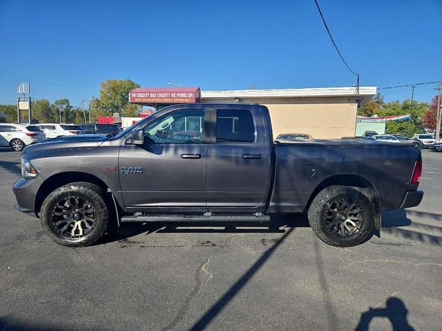 2017 GREY /BLACK RAM 1500 Sport Quad Cab 4WD (1C6RR7HT9HS) with an 5.7L V8 OHV 16V engine, 8A transmission, located at 3304 Woodville Road, Northwood, OH, 43619, (419) 210-8019, 41.612694, -83.480743 - We are #1 Auto Loan Dealer for Good Bad or No Credit we have hundreds of vehicles to choose from, stop on in or just fill out our online application to get approved for auto financing and see your credit score for free by visiting our website today. We have Low Payment Options and Terms Available - Photo#1