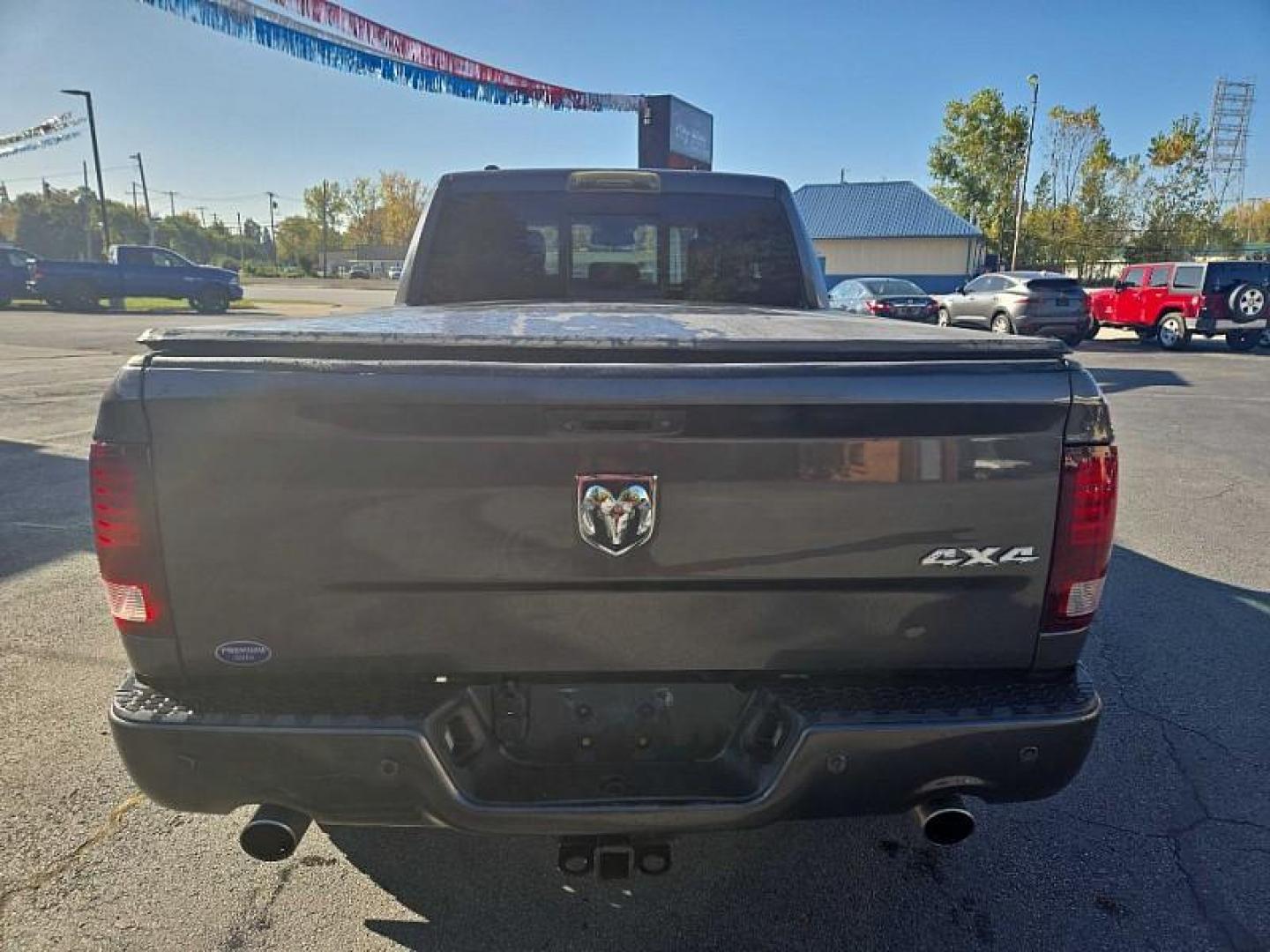 2017 GREY /BLACK RAM 1500 Sport Quad Cab 4WD (1C6RR7HT9HS) with an 5.7L V8 OHV 16V engine, 8A transmission, located at 3304 Woodville Road, Northwood, OH, 43619, (419) 210-8019, 41.612694, -83.480743 - We are #1 Auto Loan Dealer for Good Bad or No Credit we have hundreds of vehicles to choose from, stop on in or just fill out our online application to get approved for auto financing and see your credit score for free by visiting our website today. We have Low Payment Options and Terms Available - Photo#3