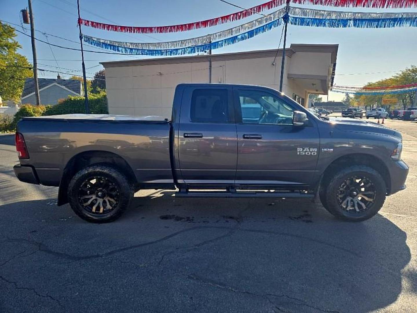 2017 GREY /BLACK RAM 1500 Sport Quad Cab 4WD (1C6RR7HT9HS) with an 5.7L V8 OHV 16V engine, 8A transmission, located at 3304 Woodville Road, Northwood, OH, 43619, (419) 210-8019, 41.612694, -83.480743 - We are #1 Auto Loan Dealer for Good Bad or No Credit we have hundreds of vehicles to choose from, stop on in or just fill out our online application to get approved for auto financing and see your credit score for free by visiting our website today. We have Low Payment Options and Terms Available - Photo#5