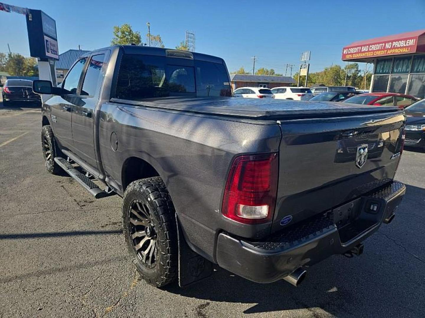 2017 GREY /BLACK RAM 1500 Sport Quad Cab 4WD (1C6RR7HT9HS) with an 5.7L V8 OHV 16V engine, 8A transmission, located at 3304 Woodville Road, Northwood, OH, 43619, (419) 210-8019, 41.612694, -83.480743 - We are #1 Auto Loan Dealer for Good Bad or No Credit we have hundreds of vehicles to choose from, stop on in or just fill out our online application to get approved for auto financing and see your credit score for free by visiting our website today. We have Low Payment Options and Terms Available - Photo#2