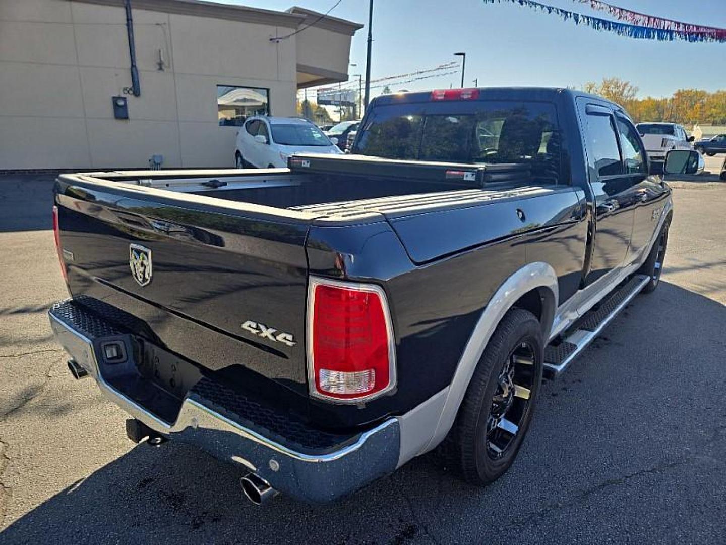 2014 BLACK /BLACK RAM 1500 Laramie Crew Cab LWB 4WD (1C6RR7VT3ES) with an 5.7L V8 OHV 16V engine, 6-Speed Automatic transmission, located at 3304 Woodville Road, Northwood, OH, 43619, (419) 210-8019, 41.612694, -83.480743 - We are #1 Auto Loan Dealer for Good Bad or No Credit we have hundreds of vehicles to choose from, stop on in or just fill out our online application to get approved for auto financing and see your credit score for free by visiting our website today. We have Low Payment Options and Terms Available - Photo#4