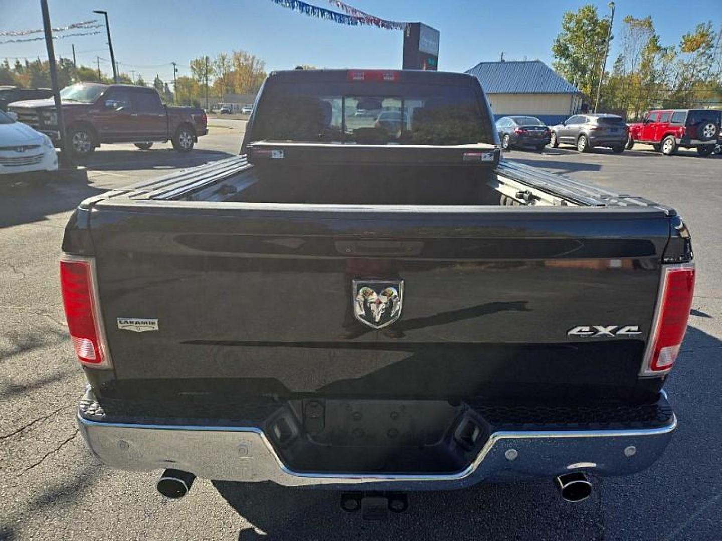 2014 BLACK /BLACK RAM 1500 Laramie Crew Cab LWB 4WD (1C6RR7VT3ES) with an 5.7L V8 OHV 16V engine, 6-Speed Automatic transmission, located at 3304 Woodville Road, Northwood, OH, 43619, (419) 210-8019, 41.612694, -83.480743 - We are #1 Auto Loan Dealer for Good Bad or No Credit we have hundreds of vehicles to choose from, stop on in or just fill out our online application to get approved for auto financing and see your credit score for free by visiting our website today. We have Low Payment Options and Terms Available - Photo#3