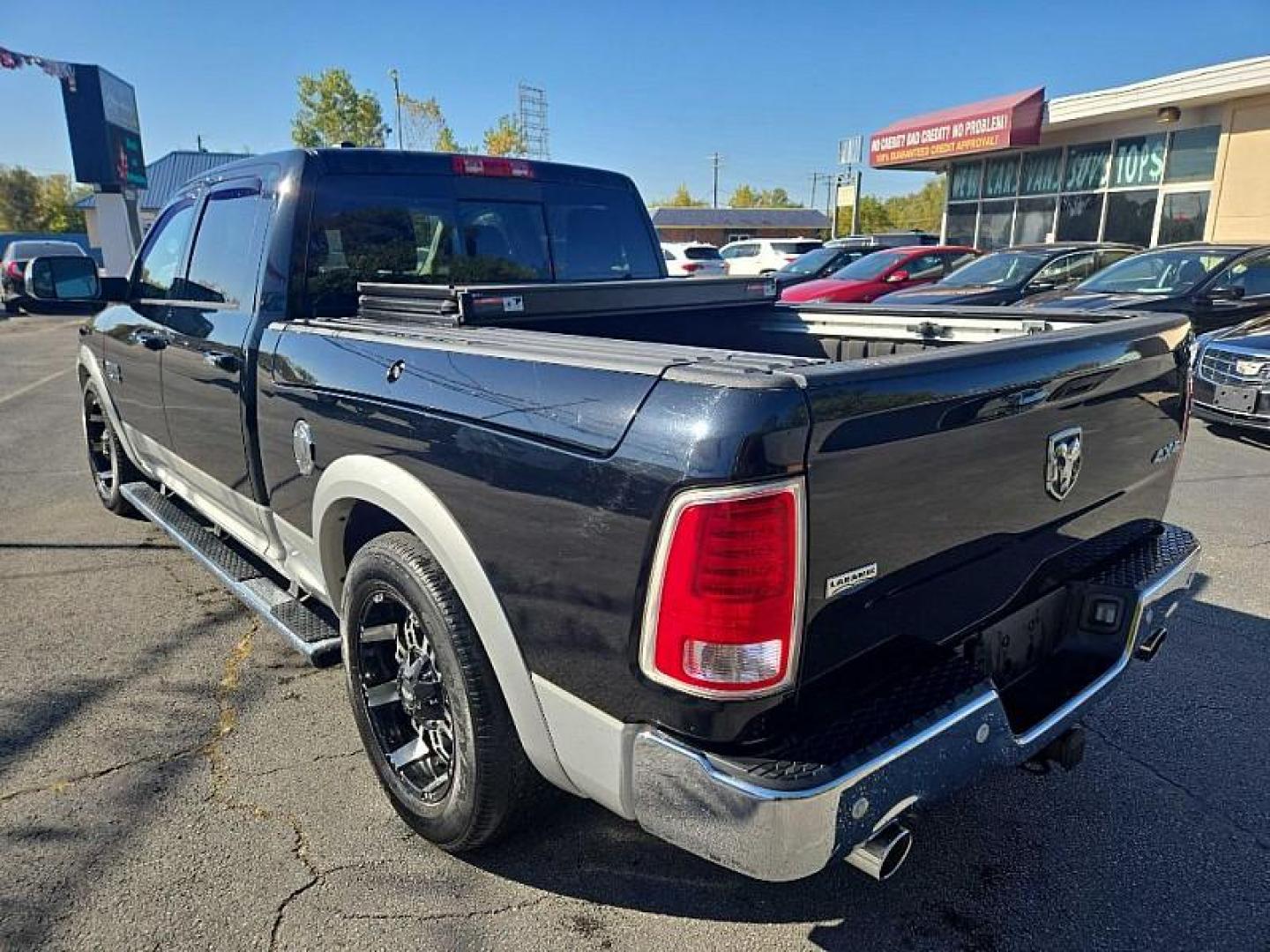 2014 BLACK /BLACK RAM 1500 Laramie Crew Cab LWB 4WD (1C6RR7VT3ES) with an 5.7L V8 OHV 16V engine, 6-Speed Automatic transmission, located at 3304 Woodville Road, Northwood, OH, 43619, (419) 210-8019, 41.612694, -83.480743 - We are #1 Auto Loan Dealer for Good Bad or No Credit we have hundreds of vehicles to choose from, stop on in or just fill out our online application to get approved for auto financing and see your credit score for free by visiting our website today. We have Low Payment Options and Terms Available - Photo#2