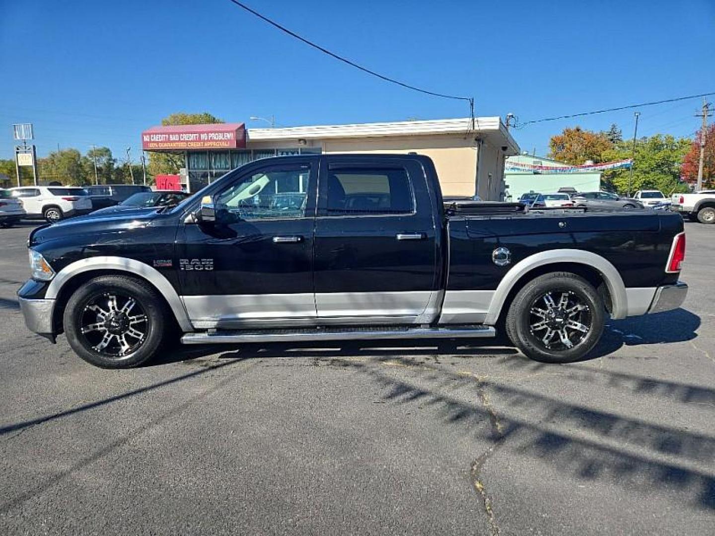 2014 BLACK /BLACK RAM 1500 Laramie Crew Cab LWB 4WD (1C6RR7VT3ES) with an 5.7L V8 OHV 16V engine, 6-Speed Automatic transmission, located at 3304 Woodville Road, Northwood, OH, 43619, (419) 210-8019, 41.612694, -83.480743 - We are #1 Auto Loan Dealer for Good Bad or No Credit we have hundreds of vehicles to choose from, stop on in or just fill out our online application to get approved for auto financing and see your credit score for free by visiting our website today. We have Low Payment Options and Terms Available - Photo#1