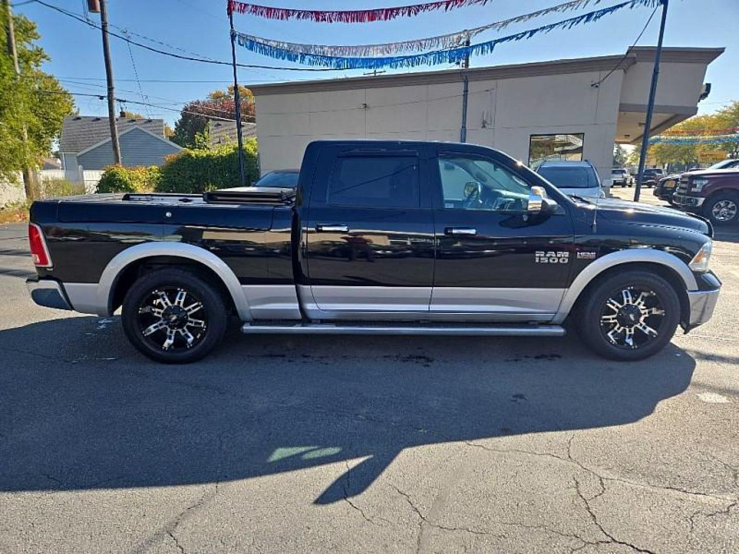 2014 BLACK /BLACK RAM 1500 Laramie Crew Cab LWB 4WD (1C6RR7VT3ES) with an 5.7L V8 OHV 16V engine, 6-Speed Automatic transmission, located at 3304 Woodville Road, Northwood, OH, 43619, (419) 210-8019, 41.612694, -83.480743 - We are #1 Auto Loan Dealer for Good Bad or No Credit we have hundreds of vehicles to choose from, stop on in or just fill out our online application to get approved for auto financing and see your credit score for free by visiting our website today. We have Low Payment Options and Terms Available - Photo#5