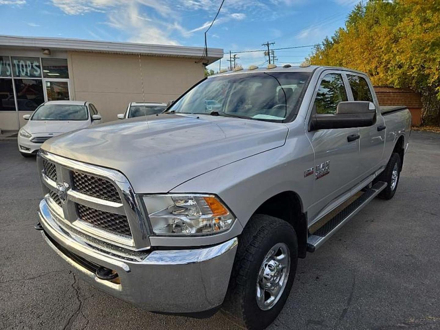 2013 SILVER /GREY RAM 2500 Tradesman Crew Cab SWB 4WD (3C6TR5CT4DG) with an 5.7L V8 OHV 16V engine, 6-Speed Automatic transmission, located at 3304 Woodville Road, Northwood, OH, 43619, (419) 210-8019, 41.612694, -83.480743 - Your #1 Destination for Auto Loans and mdash;No Matter Your Credit!At our dealership, we cater to everyone and mdash;whether you have good, bad, or no credit. With hundreds of vehicles to choose from, you can easily find the perfect car, truck, or SUV that fits your needs.Get Approved Today!Visit ou - Photo#0