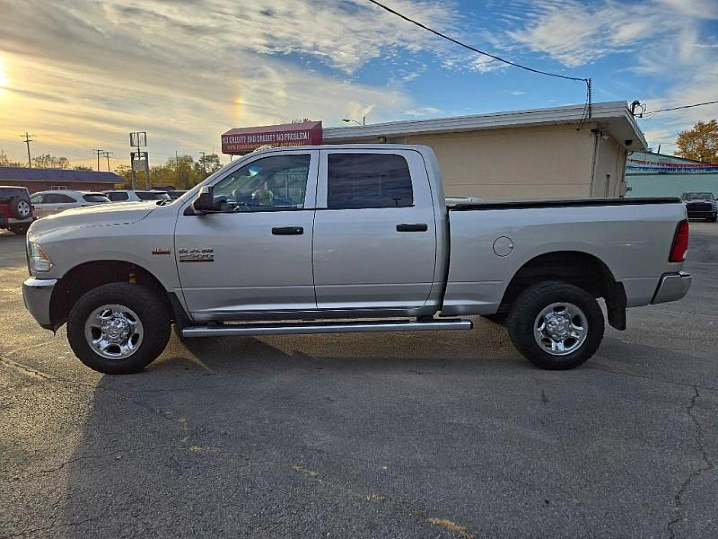 2013 SILVER /GREY RAM 2500 Tradesman Crew Cab SWB 4WD (3C6TR5CT4DG) with an 5.7L V8 OHV 16V engine, 6-Speed Automatic transmission, located at 3304 Woodville Road, Northwood, OH, 43619, (419) 210-8019, 41.612694, -83.480743 - Your #1 Destination for Auto Loans and mdash;No Matter Your Credit!At our dealership, we cater to everyone and mdash;whether you have good, bad, or no credit. With hundreds of vehicles to choose from, you can easily find the perfect car, truck, or SUV that fits your needs.Get Approved Today!Visit ou - Photo#1