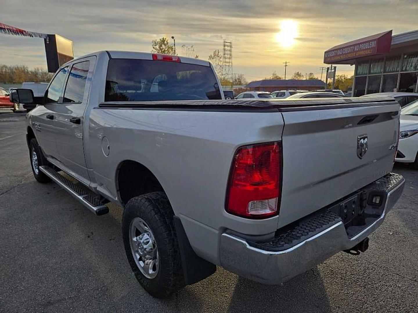 2013 SILVER /GREY RAM 2500 Tradesman Crew Cab SWB 4WD (3C6TR5CT4DG) with an 5.7L V8 OHV 16V engine, 6-Speed Automatic transmission, located at 3304 Woodville Road, Northwood, OH, 43619, (419) 210-8019, 41.612694, -83.480743 - Your #1 Destination for Auto Loans and mdash;No Matter Your Credit!At our dealership, we cater to everyone and mdash;whether you have good, bad, or no credit. With hundreds of vehicles to choose from, you can easily find the perfect car, truck, or SUV that fits your needs.Get Approved Today!Visit ou - Photo#2