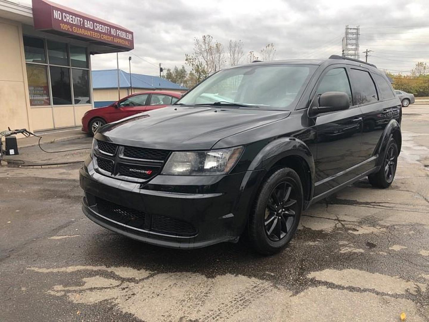 2020 BLACK /BLACK Dodge Journey SE Value (3C4PDCAB6LT) with an 2.4L L4 DOHC 16V engine, 6A transmission, located at 3304 Woodville Road, Northwood, OH, 43619, (419) 210-8019, 41.612694, -83.480743 - Your #1 Destination for Auto Loans and mdash;No Matter Your Credit!At our dealership, we cater to everyone and mdash;whether you have good, bad, or no credit. With hundreds of vehicles to choose from, you can easily find the perfect car, truck, or SUV that fits your needs.Get Approved Today!Visit ou - Photo#0