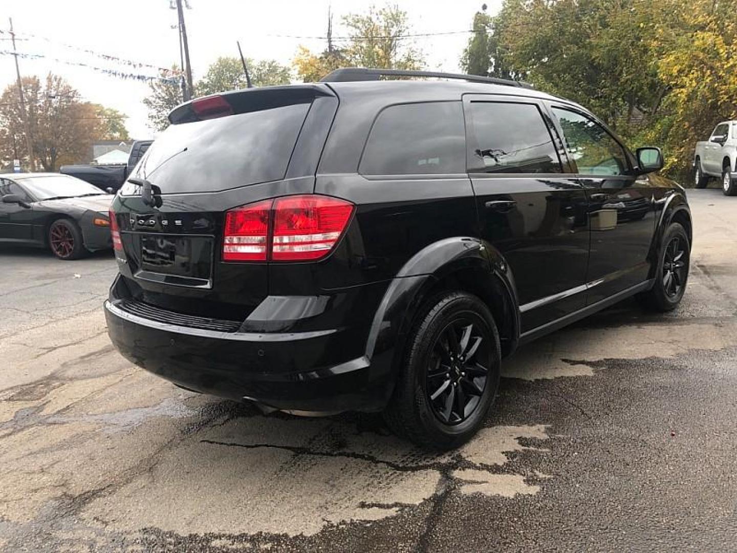 2020 BLACK /BLACK Dodge Journey SE Value (3C4PDCAB6LT) with an 2.4L L4 DOHC 16V engine, 6A transmission, located at 3304 Woodville Road, Northwood, OH, 43619, (419) 210-8019, 41.612694, -83.480743 - Your #1 Destination for Auto Loans and mdash;No Matter Your Credit!At our dealership, we cater to everyone and mdash;whether you have good, bad, or no credit. With hundreds of vehicles to choose from, you can easily find the perfect car, truck, or SUV that fits your needs.Get Approved Today!Visit ou - Photo#4