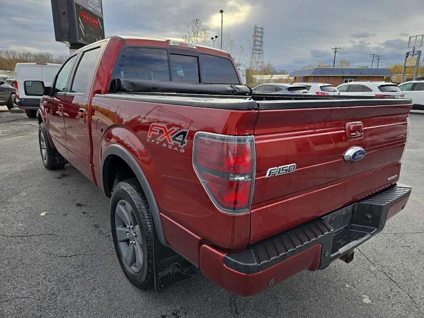 2014 ORANGE /BLACK Ford F-150 XL SuperCrew 5.5-ft. Bed 4WD (1FTFW1EF4EK) with an 5.0L V8 engine, 6-Speed Automatic transmission, located at 3304 Woodville Road, Northwood, OH, 43619, (419) 210-8019, 41.612694, -83.480743 - Your #1 Destination for Auto Loans and mdash;No Matter Your Credit!At our dealership, we cater to everyone and mdash;whether you have good, bad, or no credit. With hundreds of vehicles to choose from, you can easily find the perfect car, truck, or SUV that fits your needs.Get Approved Today!Visit ou - Photo#2