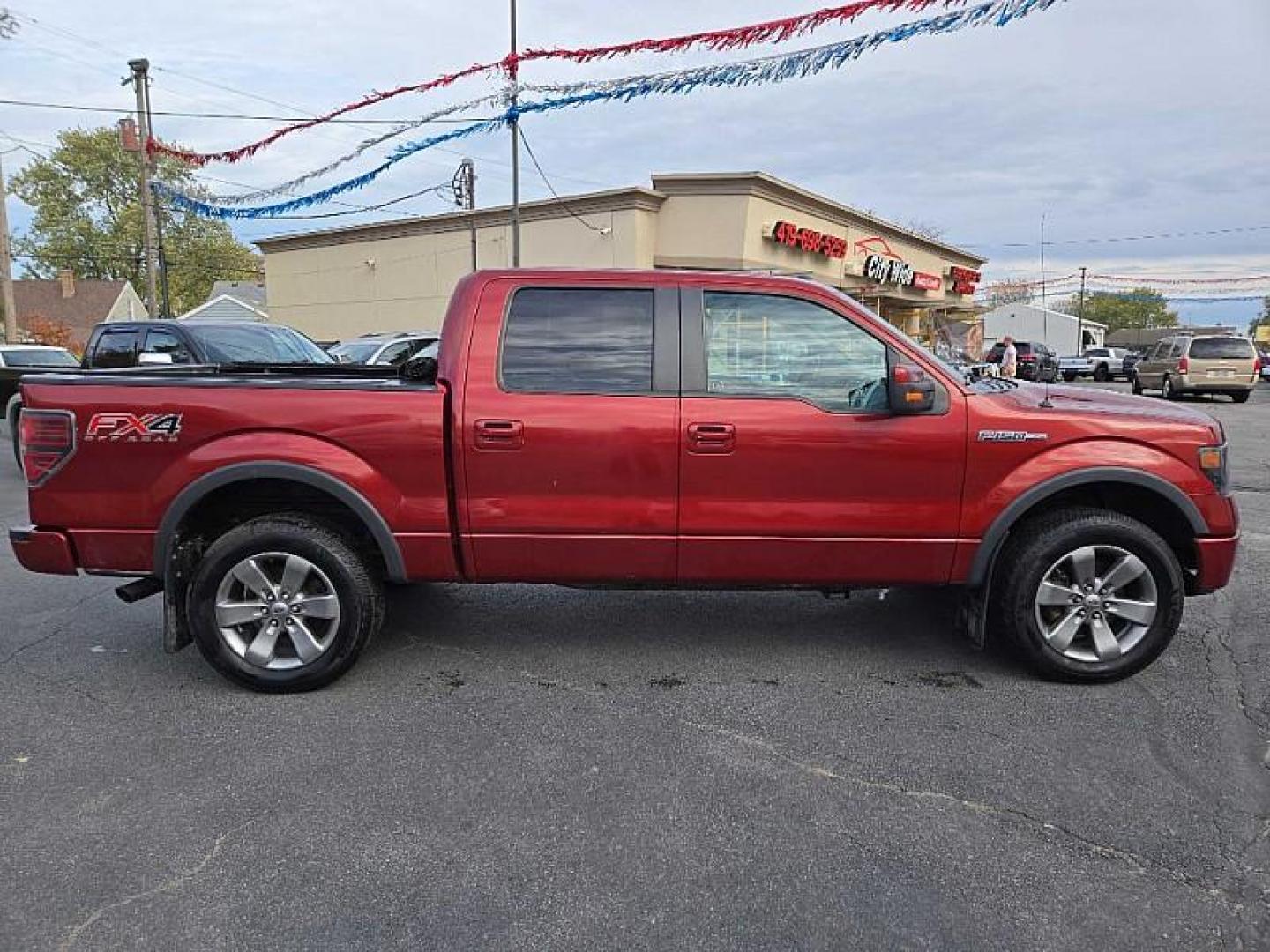 2014 ORANGE /BLACK Ford F-150 XL SuperCrew 5.5-ft. Bed 4WD (1FTFW1EF4EK) with an 5.0L V8 engine, 6-Speed Automatic transmission, located at 3304 Woodville Road, Northwood, OH, 43619, (419) 210-8019, 41.612694, -83.480743 - Your #1 Destination for Auto Loans and mdash;No Matter Your Credit!At our dealership, we cater to everyone and mdash;whether you have good, bad, or no credit. With hundreds of vehicles to choose from, you can easily find the perfect car, truck, or SUV that fits your needs.Get Approved Today!Visit ou - Photo#5