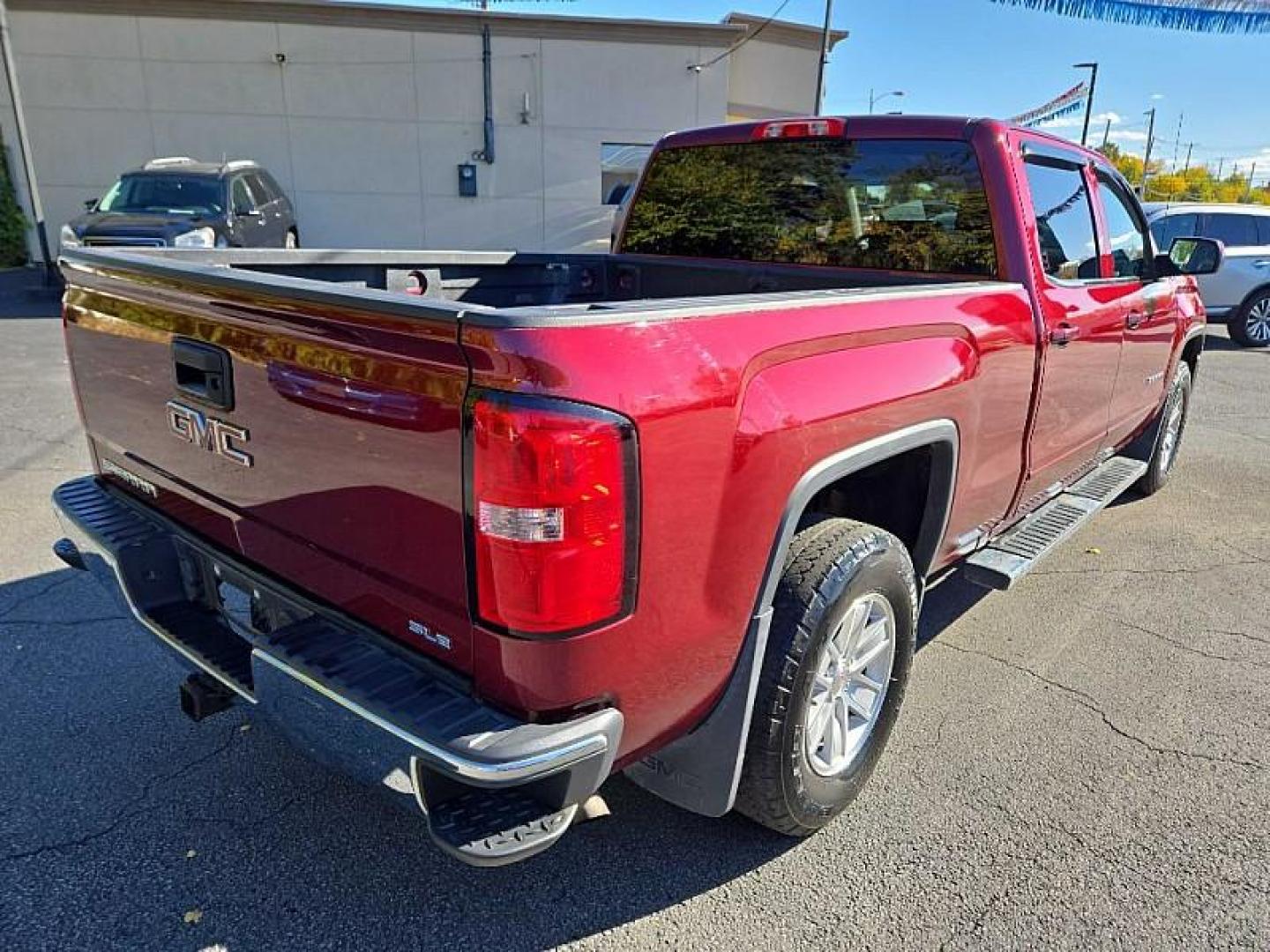 2016 RED /BLACK GMC Sierra 1500 SLE Crew Cab Long Box 4WD (3GTU2MEC3GG) with an 5.3L V8 OHV 16V engine, 6A transmission, located at 3304 Woodville Road, Northwood, OH, 43619, (419) 210-8019, 41.612694, -83.480743 - We are #1 Auto Loan Dealer for Good Bad or No Credit we have hundreds of vehicles to choose from, stop on in or just fill out our online application to get approved for auto financing and see your credit score for free by visiting our website today. We have Low Payment Options and Terms Available - Photo#4