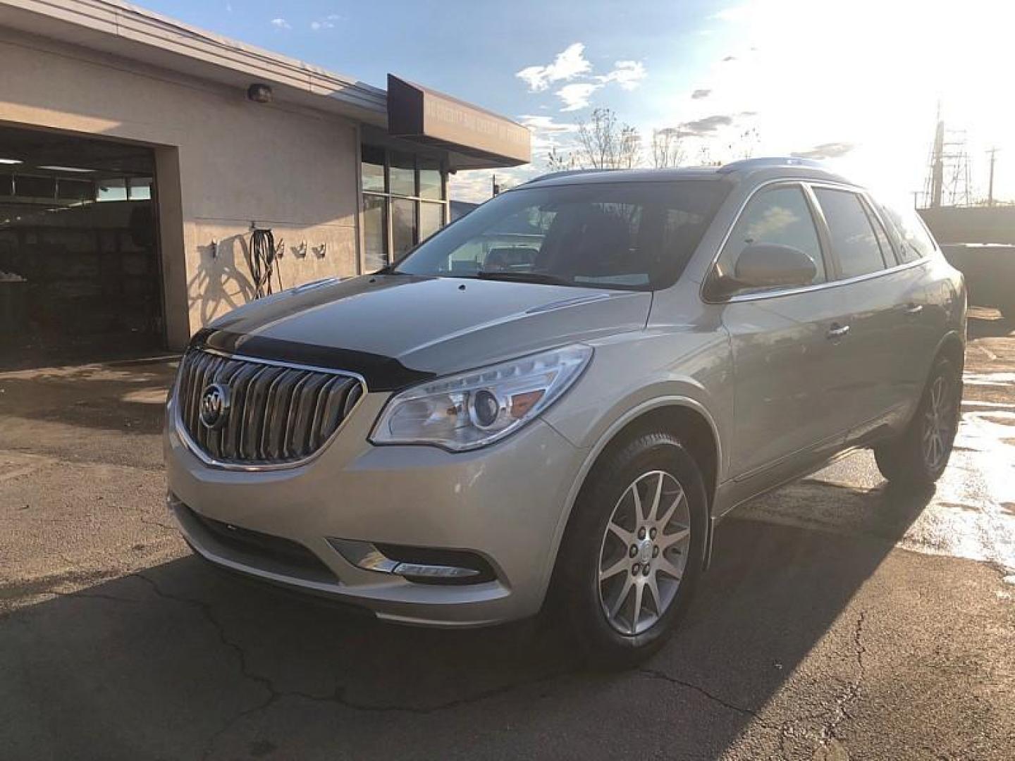 2015 TAN /BLACK Buick Enclave Leather AWD (5GAKVBKD5FJ) with an 3.6L V6 DOHC 24V engine, 6-Speed Automatic Overdrive transmission, located at 3304 Woodville Road, Northwood, OH, 43619, (419) 210-8019, 41.612694, -83.480743 - Your #1 Destination for Auto Loans and mdash;No Matter Your Credit!At our dealership, we cater to everyone and mdash;whether you have good, bad, or no credit. With hundreds of vehicles to choose from, you can easily find the perfect car, truck, or SUV that fits your needs.Get Approved Today!Visit ou - Photo#0