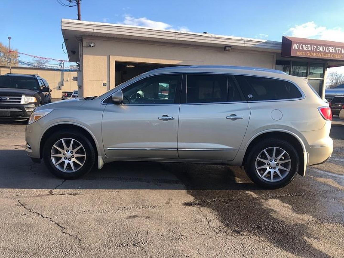 2015 TAN /BLACK Buick Enclave Leather AWD (5GAKVBKD5FJ) with an 3.6L V6 DOHC 24V engine, 6-Speed Automatic Overdrive transmission, located at 3304 Woodville Road, Northwood, OH, 43619, (419) 210-8019, 41.612694, -83.480743 - Your #1 Destination for Auto Loans and mdash;No Matter Your Credit!At our dealership, we cater to everyone and mdash;whether you have good, bad, or no credit. With hundreds of vehicles to choose from, you can easily find the perfect car, truck, or SUV that fits your needs.Get Approved Today!Visit ou - Photo#1