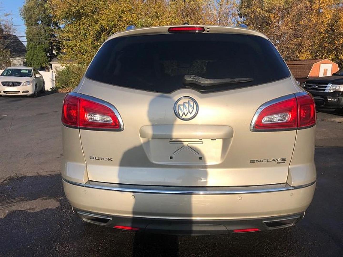 2015 TAN /BLACK Buick Enclave Leather AWD (5GAKVBKD5FJ) with an 3.6L V6 DOHC 24V engine, 6-Speed Automatic Overdrive transmission, located at 3304 Woodville Road, Northwood, OH, 43619, (419) 210-8019, 41.612694, -83.480743 - Your #1 Destination for Auto Loans and mdash;No Matter Your Credit!At our dealership, we cater to everyone and mdash;whether you have good, bad, or no credit. With hundreds of vehicles to choose from, you can easily find the perfect car, truck, or SUV that fits your needs.Get Approved Today!Visit ou - Photo#3