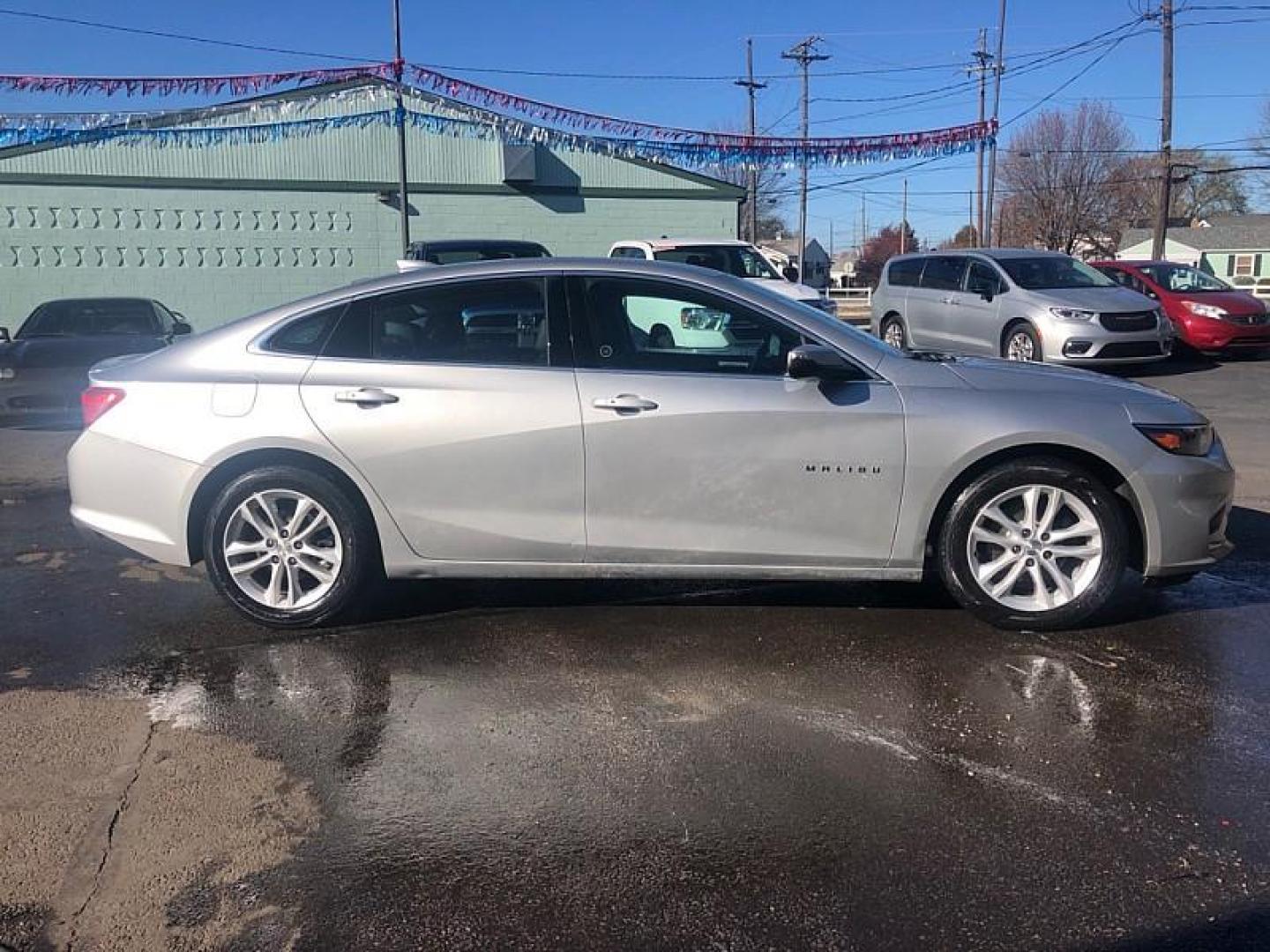 2017 SILVER /BLACK Chevrolet Malibu 1LT (1G1ZE5ST7HF) with an 1.5L L4 DOHC 16V engine, 6A transmission, located at 3304 Woodville Road, Northwood, OH, 43619, (419) 210-8019, 41.612694, -83.480743 - Your #1 Destination for Auto Loans and mdash;No Matter Your Credit!At our dealership, we cater to everyone and mdash;whether you have good, bad, or no credit. With hundreds of vehicles to choose from, you can easily find the perfect car, truck, or SUV that fits your needs.Get Approved Today!Visit ou - Photo#5