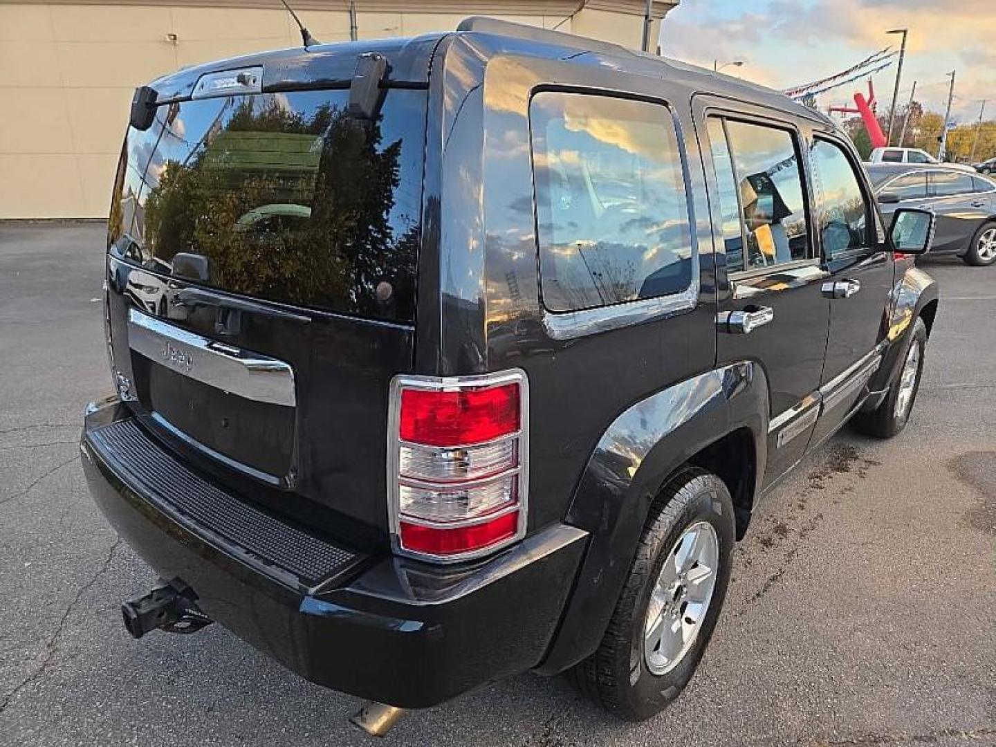 2012 BLACK /BLACK Jeep Liberty Sport 4WD (1C4PJMAK6CW) with an 3.7L V6 SOHC 12V engine, 4-Speed Automatic transmission, located at 3304 Woodville Road, Northwood, OH, 43619, (419) 210-8019, 41.612694, -83.480743 - Your #1 Destination for Auto Loans and mdash;No Matter Your Credit!At our dealership, we cater to everyone and mdash;whether you have good, bad, or no credit. With hundreds of vehicles to choose from, you can easily find the perfect car, truck, or SUV that fits your needs.Get Approved Today!Visit ou - Photo#4