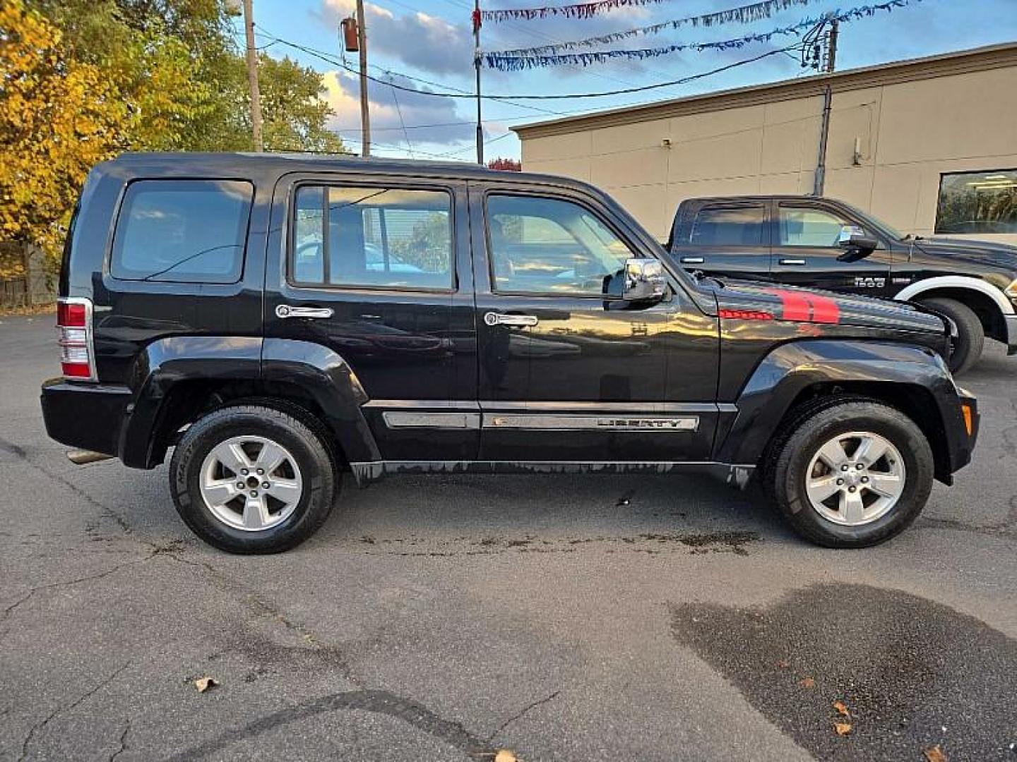 2012 BLACK /BLACK Jeep Liberty Sport 4WD (1C4PJMAK6CW) with an 3.7L V6 SOHC 12V engine, 4-Speed Automatic transmission, located at 3304 Woodville Road, Northwood, OH, 43619, (419) 210-8019, 41.612694, -83.480743 - Your #1 Destination for Auto Loans and mdash;No Matter Your Credit!At our dealership, we cater to everyone and mdash;whether you have good, bad, or no credit. With hundreds of vehicles to choose from, you can easily find the perfect car, truck, or SUV that fits your needs.Get Approved Today!Visit ou - Photo#5