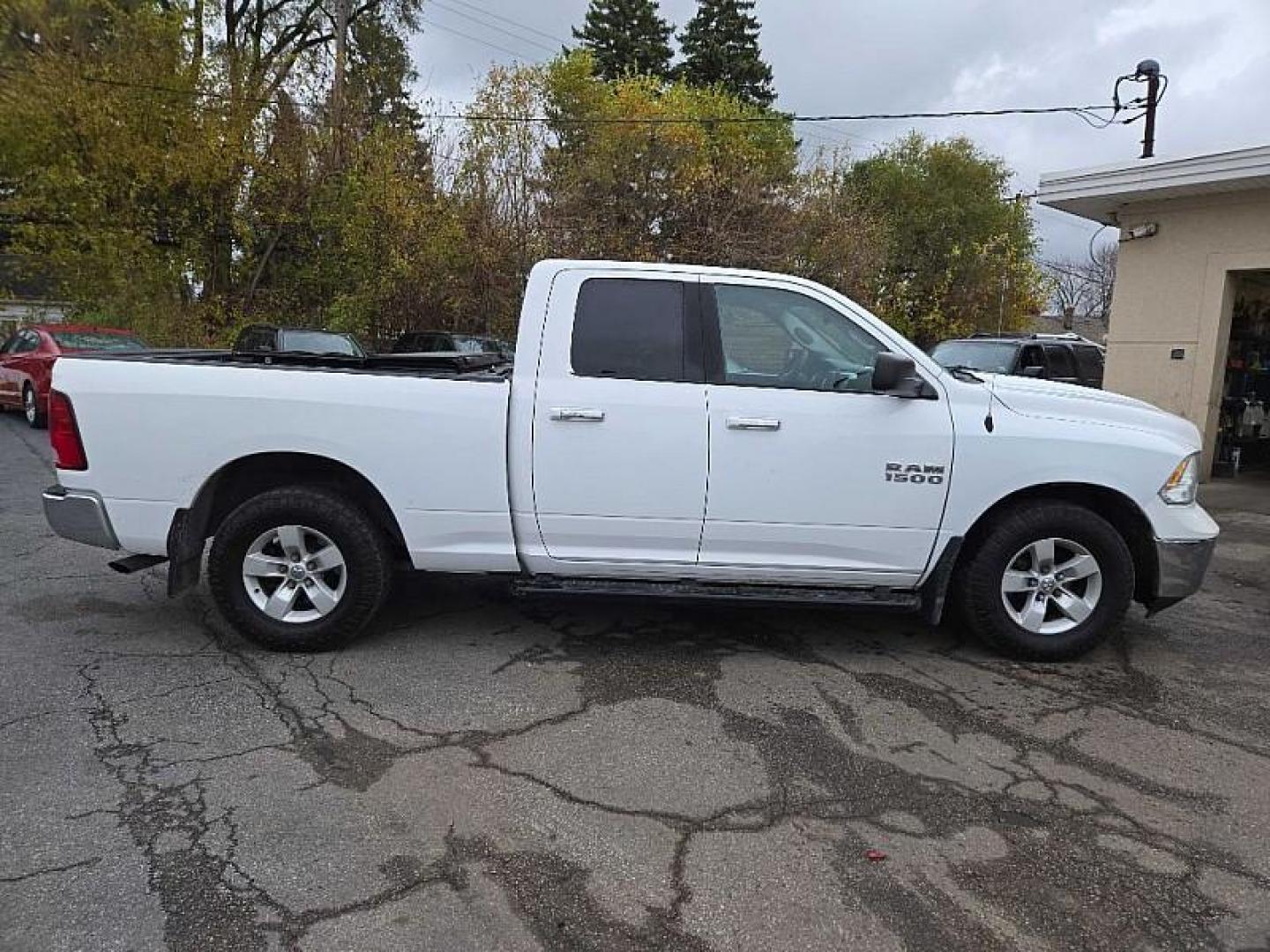 2016 WHITE /GREY RAM 1500 SLT Quad Cab 2WD (1C6RR6GG2GS) with an 3.6L V6 DOHC 24V FFV engine, 6A transmission, located at 3304 Woodville Road, Northwood, OH, 43619, (419) 210-8019, 41.612694, -83.480743 - Your #1 Destination for Auto Loans and mdash;No Matter Your Credit!At our dealership, we cater to everyone and mdash;whether you have good, bad, or no credit. With hundreds of vehicles to choose from, you can easily find the perfect car, truck, or SUV that fits your needs.Get Approved Today!Visit ou - Photo#3