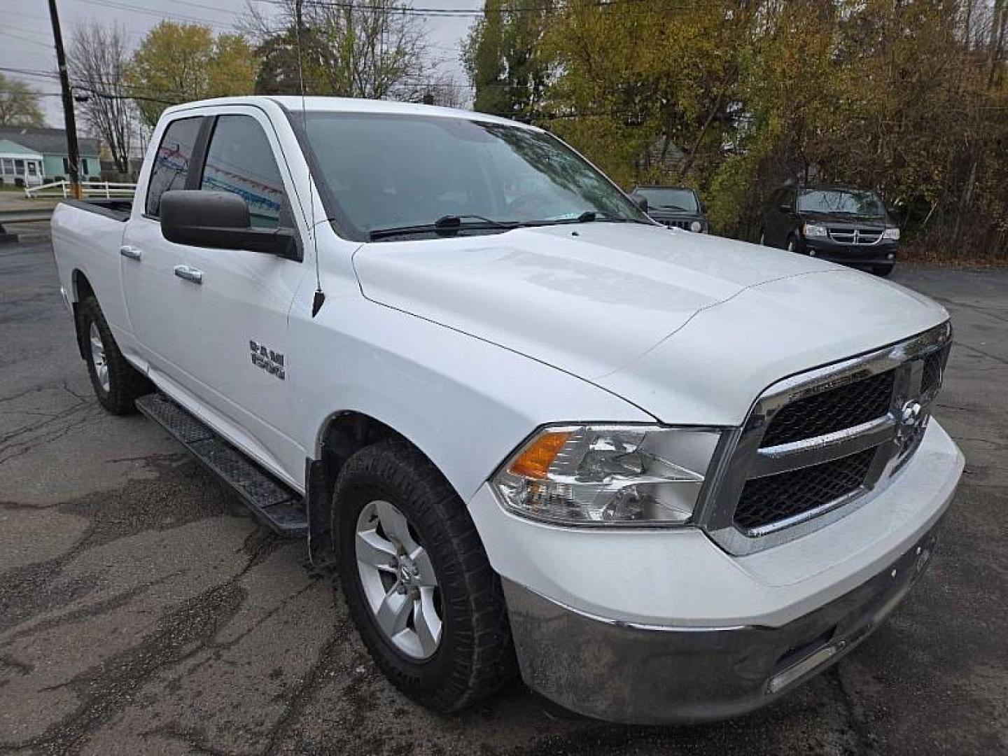 2016 WHITE /GREY RAM 1500 SLT Quad Cab 2WD (1C6RR6GG2GS) with an 3.6L V6 DOHC 24V FFV engine, 6A transmission, located at 3304 Woodville Road, Northwood, OH, 43619, (419) 210-8019, 41.612694, -83.480743 - Your #1 Destination for Auto Loans and mdash;No Matter Your Credit!At our dealership, we cater to everyone and mdash;whether you have good, bad, or no credit. With hundreds of vehicles to choose from, you can easily find the perfect car, truck, or SUV that fits your needs.Get Approved Today!Visit ou - Photo#4