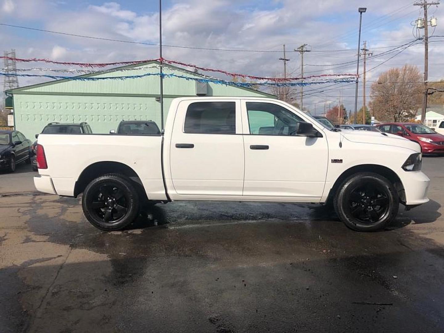 2020 WHITE /BLACK RAM 1500 Classic Tradesman Crew Cab SWB 4WD (1C6RR7KT8LS) with an 5.7L V8 OHV 16V engine, 8A transmission, located at 3304 Woodville Road, Northwood, OH, 43619, (419) 210-8019, 41.612694, -83.480743 - Your #1 Destination for Auto Loans and mdash;No Matter Your Credit!At our dealership, we cater to everyone and mdash;whether you have good, bad, or no credit. With hundreds of vehicles to choose from, you can easily find the perfect car, truck, or SUV that fits your needs.Get Approved Today!Visit ou - Photo#5