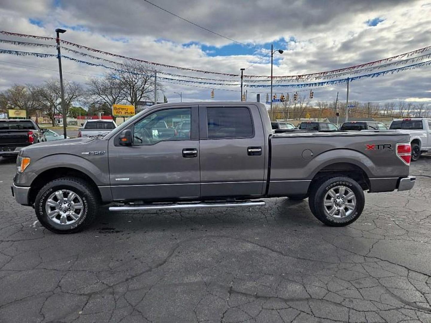 2014 GREY /GREY Ford F-150 FX4 SuperCrew 5.5-ft. Bed 4WD (1FTFW1ET0EF) with an 3.5L V6 TURBO engine, 6-Speed Automatic transmission, located at 3304 Woodville Road, Northwood, OH, 43619, (419) 210-8019, 41.612694, -83.480743 - Your #1 Destination for Auto Loans and mdash;No Matter Your Credit!At our dealership, we cater to everyone and mdash;whether you have good, bad, or no credit. With hundreds of vehicles to choose from, you can easily find the perfect car, truck, or SUV that fits your needs.Get Approved Today!Visit ou - Photo#1