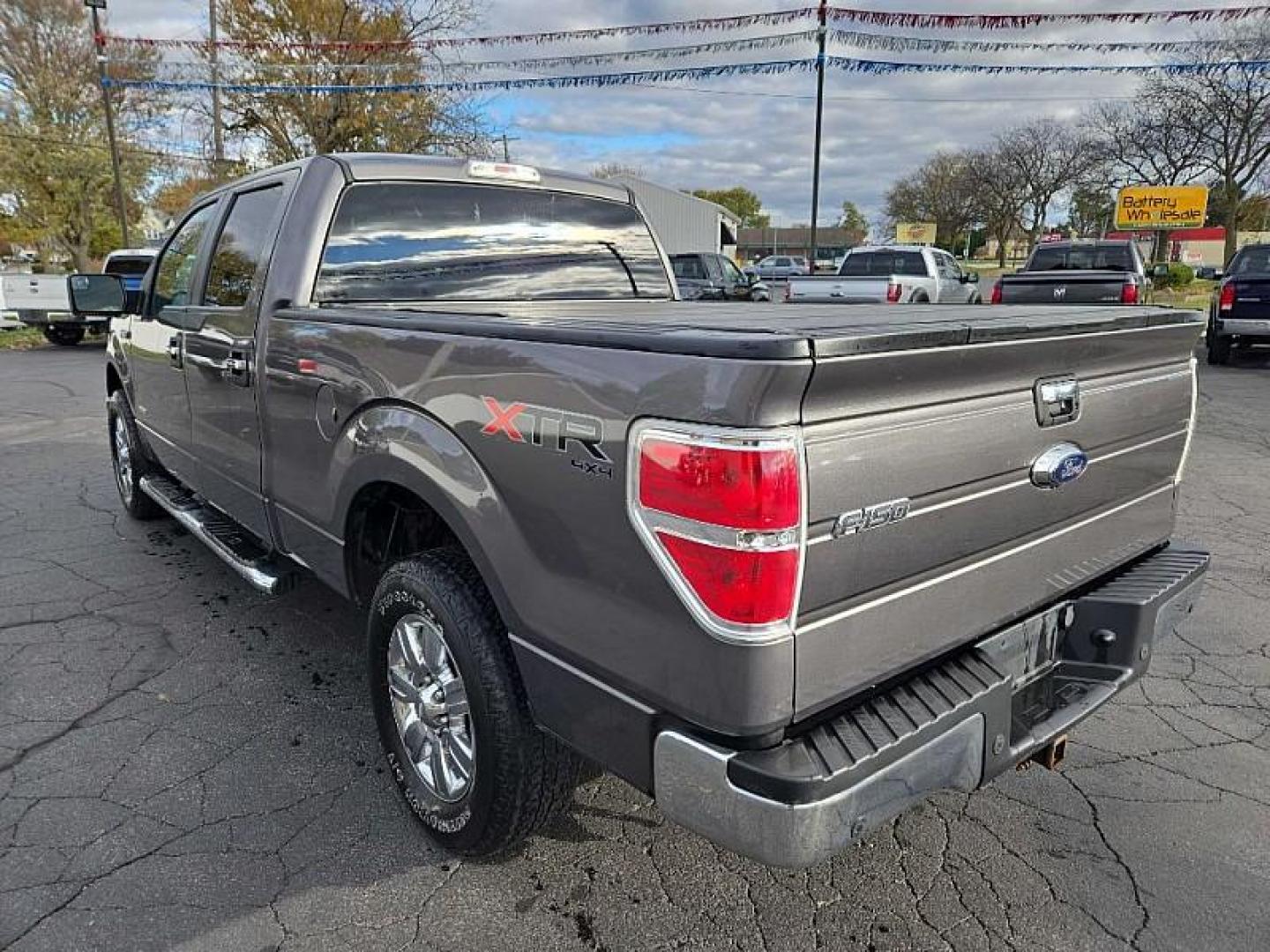 2014 GREY /GREY Ford F-150 FX4 SuperCrew 5.5-ft. Bed 4WD (1FTFW1ET0EF) with an 3.5L V6 TURBO engine, 6-Speed Automatic transmission, located at 3304 Woodville Road, Northwood, OH, 43619, (419) 210-8019, 41.612694, -83.480743 - Your #1 Destination for Auto Loans and mdash;No Matter Your Credit!At our dealership, we cater to everyone and mdash;whether you have good, bad, or no credit. With hundreds of vehicles to choose from, you can easily find the perfect car, truck, or SUV that fits your needs.Get Approved Today!Visit ou - Photo#2