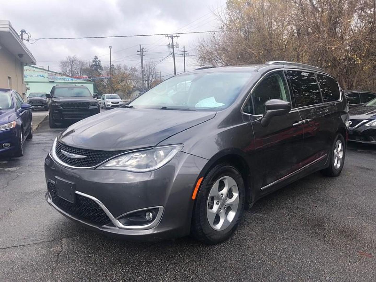 2017 GREY /BLACK Chrysler Pacifica Touring-L Plus (2C4RC1EG0HR) with an 3.6L V6 DOHC 24V engine, 9A transmission, located at 3304 Woodville Road, Northwood, OH, 43619, (419) 210-8019, 41.612694, -83.480743 - Your #1 Destination for Auto Loans and mdash;No Matter Your Credit!At our dealership, we cater to everyone and mdash;whether you have good, bad, or no credit. With hundreds of vehicles to choose from, you can easily find the perfect car, truck, or SUV that fits your needs.Get Approved Today!Visit ou - Photo#0