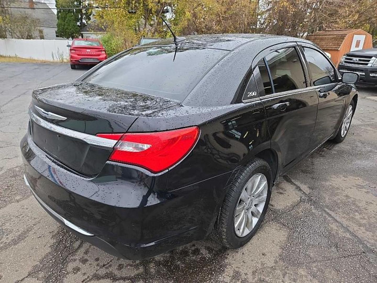 2012 BLACK /BLACK Chrysler 200 Touring (1C3CCBBB7CN) with an 2.4L L4 DOHC 16V engine, 6-Speed Automatic transmission, located at 3304 Woodville Road, Northwood, OH, 43619, (419) 210-8019, 41.612694, -83.480743 - Your #1 Destination for Auto Loans and mdash;No Matter Your Credit!At our dealership, we cater to everyone and mdash;whether you have good, bad, or no credit. With hundreds of vehicles to choose from, you can easily find the perfect car, truck, or SUV that fits your needs.Get Approved Today!Visit ou - Photo#4