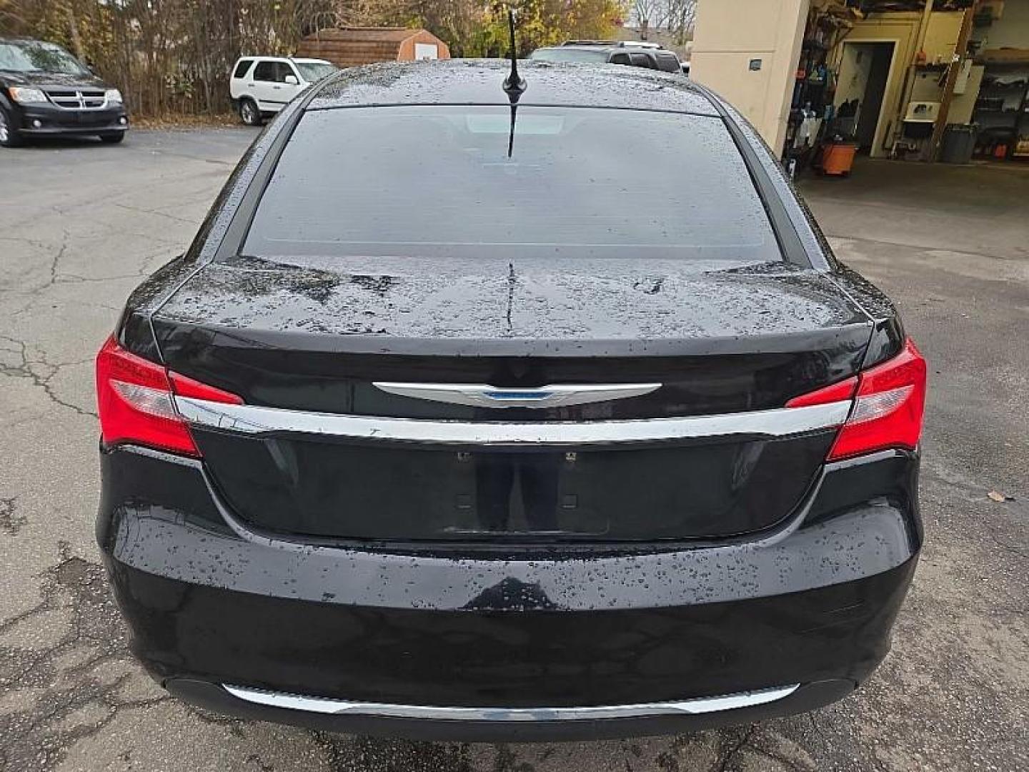 2012 BLACK /BLACK Chrysler 200 Touring (1C3CCBBB7CN) with an 2.4L L4 DOHC 16V engine, 6-Speed Automatic transmission, located at 3304 Woodville Road, Northwood, OH, 43619, (419) 210-8019, 41.612694, -83.480743 - Your #1 Destination for Auto Loans and mdash;No Matter Your Credit!At our dealership, we cater to everyone and mdash;whether you have good, bad, or no credit. With hundreds of vehicles to choose from, you can easily find the perfect car, truck, or SUV that fits your needs.Get Approved Today!Visit ou - Photo#3