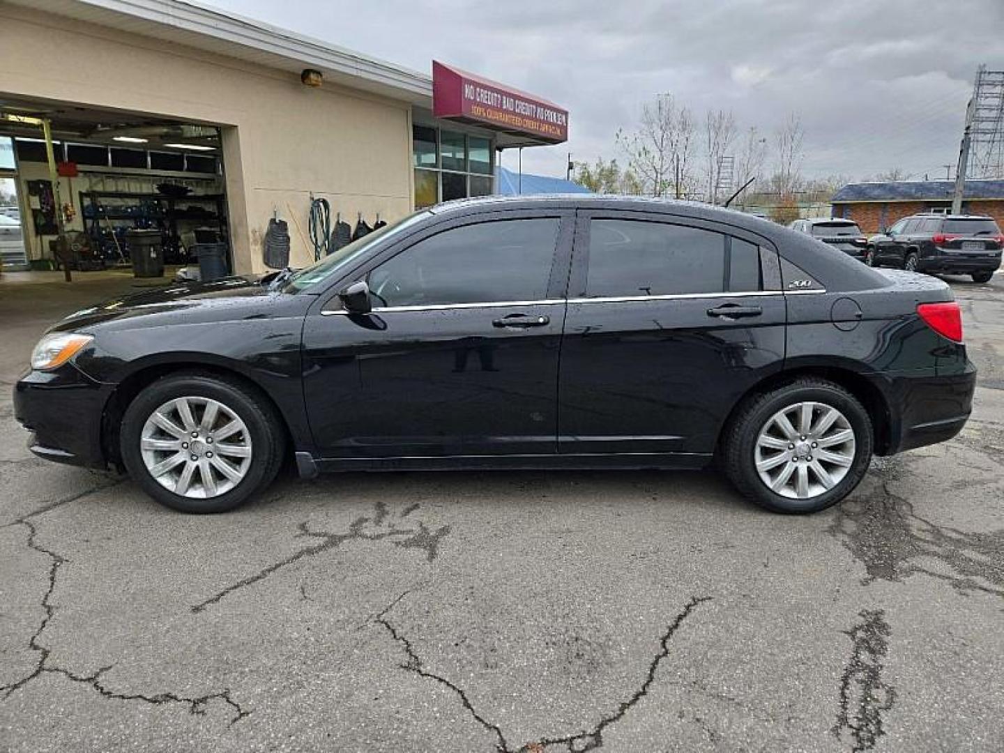 2012 BLACK /BLACK Chrysler 200 Touring (1C3CCBBB7CN) with an 2.4L L4 DOHC 16V engine, 6-Speed Automatic transmission, located at 3304 Woodville Road, Northwood, OH, 43619, (419) 210-8019, 41.612694, -83.480743 - Your #1 Destination for Auto Loans and mdash;No Matter Your Credit!At our dealership, we cater to everyone and mdash;whether you have good, bad, or no credit. With hundreds of vehicles to choose from, you can easily find the perfect car, truck, or SUV that fits your needs.Get Approved Today!Visit ou - Photo#1