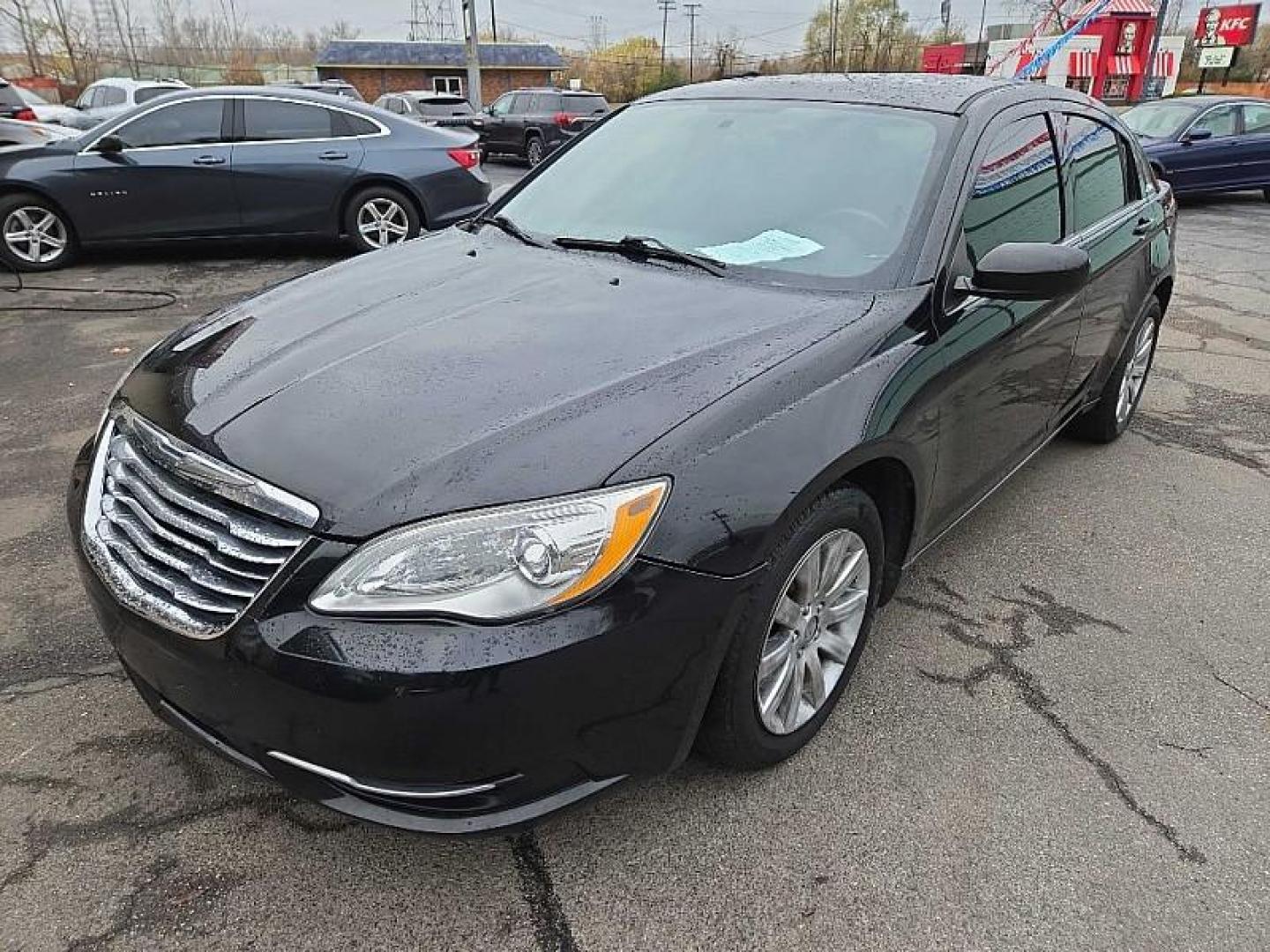 2012 BLACK /BLACK Chrysler 200 Touring (1C3CCBBB7CN) with an 2.4L L4 DOHC 16V engine, 6-Speed Automatic transmission, located at 3304 Woodville Road, Northwood, OH, 43619, (419) 210-8019, 41.612694, -83.480743 - Your #1 Destination for Auto Loans and mdash;No Matter Your Credit!At our dealership, we cater to everyone and mdash;whether you have good, bad, or no credit. With hundreds of vehicles to choose from, you can easily find the perfect car, truck, or SUV that fits your needs.Get Approved Today!Visit ou - Photo#0