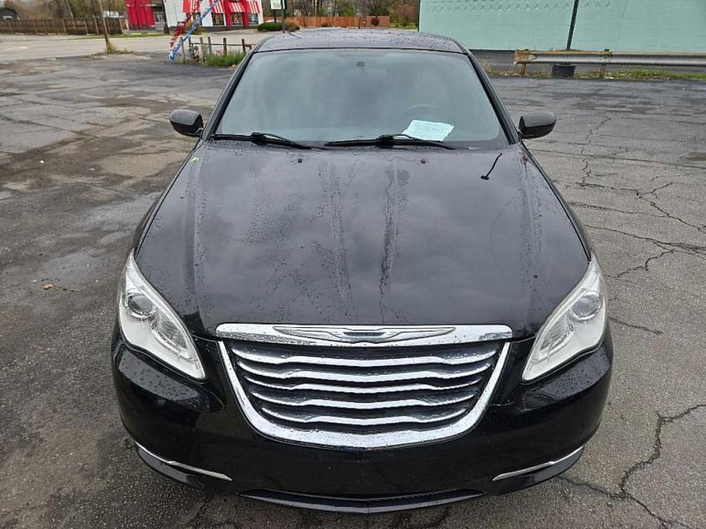 2012 BLACK /BLACK Chrysler 200 Touring (1C3CCBBB7CN) with an 2.4L L4 DOHC 16V engine, 6-Speed Automatic transmission, located at 3304 Woodville Road, Northwood, OH, 43619, (419) 210-8019, 41.612694, -83.480743 - Your #1 Destination for Auto Loans and mdash;No Matter Your Credit!At our dealership, we cater to everyone and mdash;whether you have good, bad, or no credit. With hundreds of vehicles to choose from, you can easily find the perfect car, truck, or SUV that fits your needs.Get Approved Today!Visit ou - Photo#7