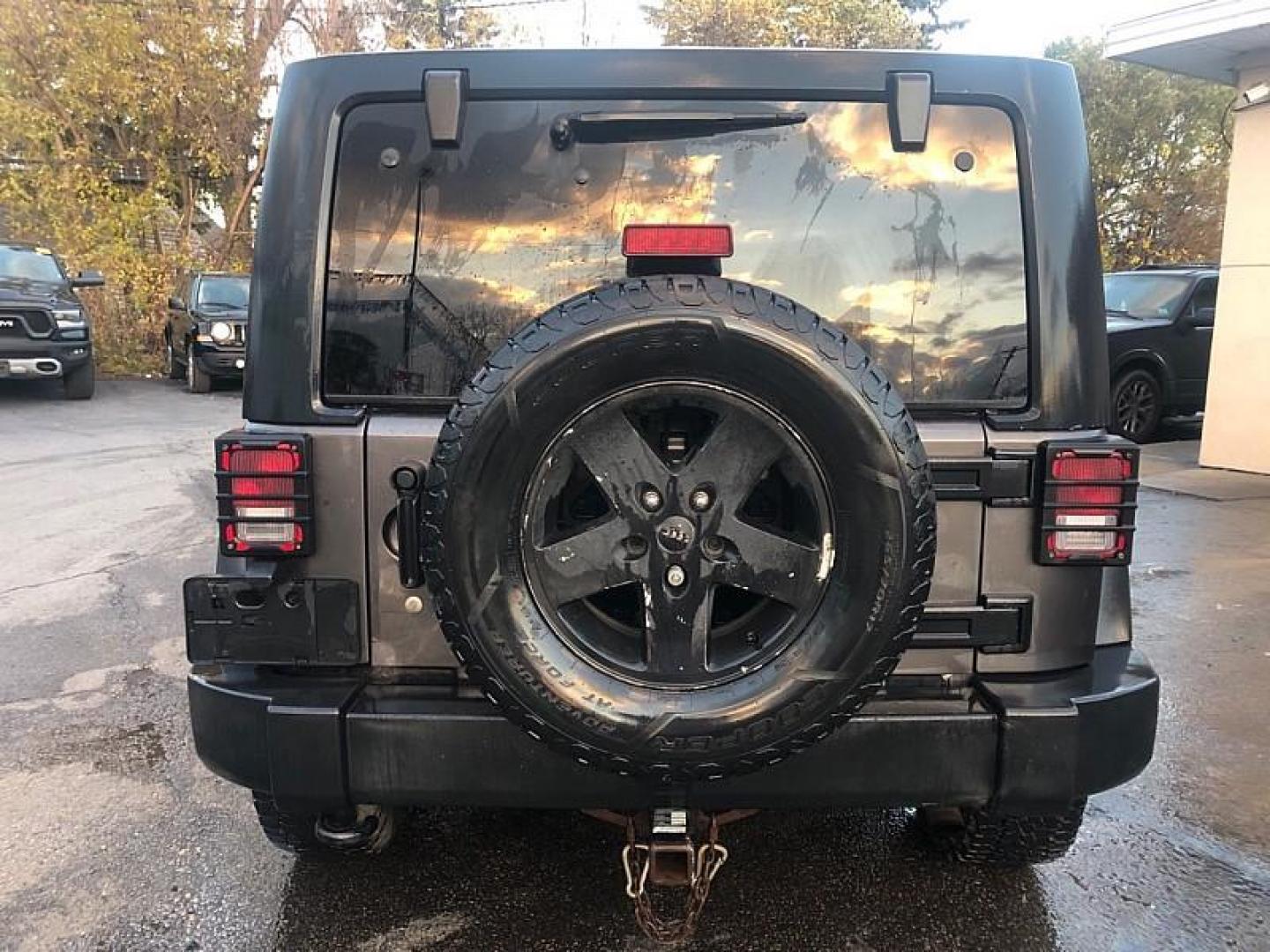 2016 GREY /BLACK Jeep Wrangler Unlimited Sport 4WD (1C4BJWDG1GL) with an 3.6L V6 DOHC 24V FFV engine, Manual 6-Spd transmission, located at 3304 Woodville Road, Northwood, OH, 43619, (419) 210-8019, 41.612694, -83.480743 - Your #1 Destination for Auto Loans and mdash;No Matter Your Credit!At our dealership, we cater to everyone and mdash;whether you have good, bad, or no credit. With hundreds of vehicles to choose from, you can easily find the perfect car, truck, or SUV that fits your needs.Get Approved Today!Visit ou - Photo#3