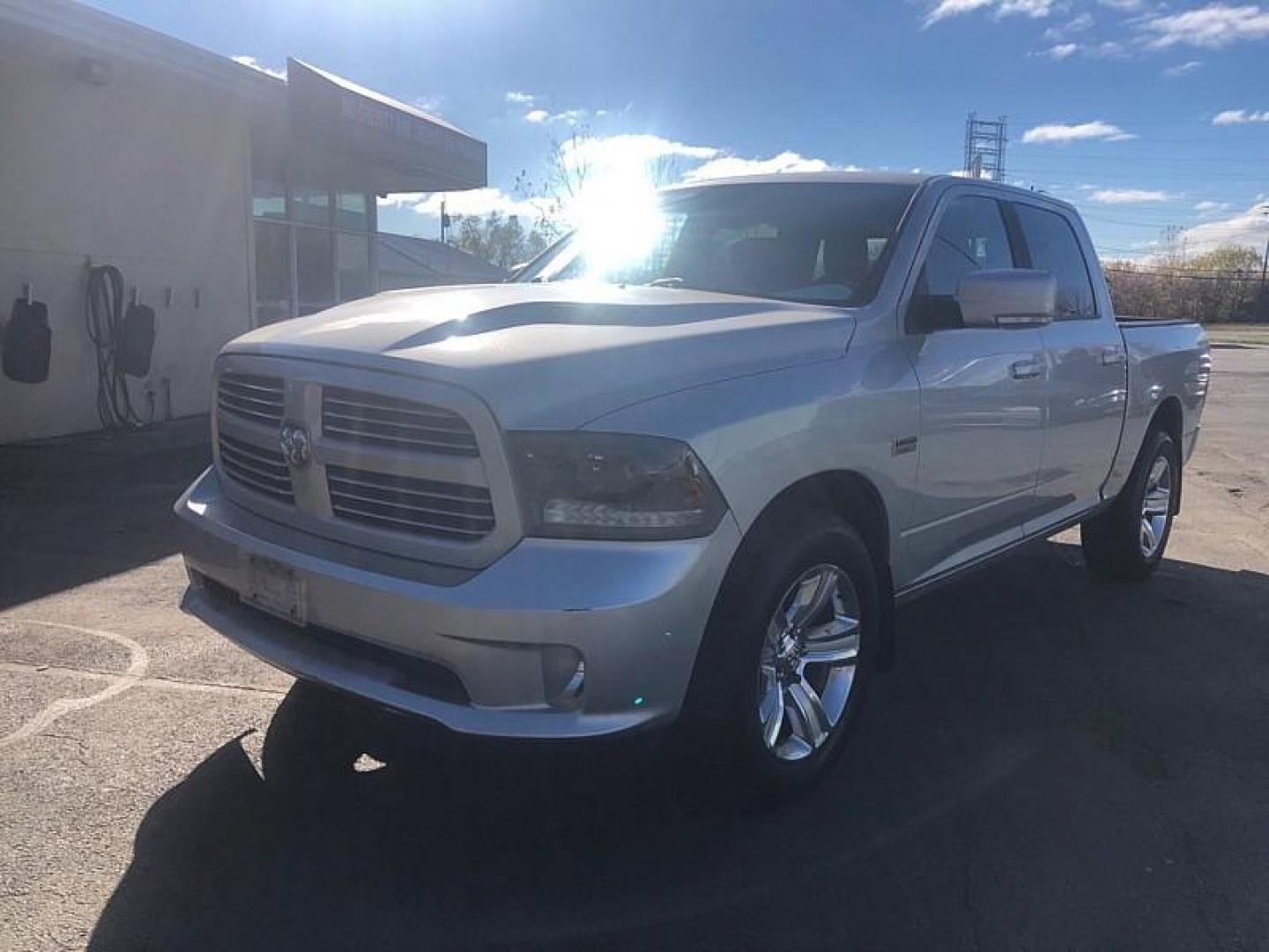 2015 SILVER /BLACK RAM 1500 Sport Crew Cab SWB 4WD (1C6RR7MT9FS) with an 5.7L V8 OHV 16V engine, 6-Speed Automatic transmission, located at 3304 Woodville Road, Northwood, OH, 43619, (419) 210-8019, 41.612694, -83.480743 - Your #1 Destination for Auto Loans and mdash;No Matter Your Credit!At our dealership, we cater to everyone and mdash;whether you have good, bad, or no credit. With hundreds of vehicles to choose from, you can easily find the perfect car, truck, or SUV that fits your needs.Get Approved Today!Visit ou - Photo#0