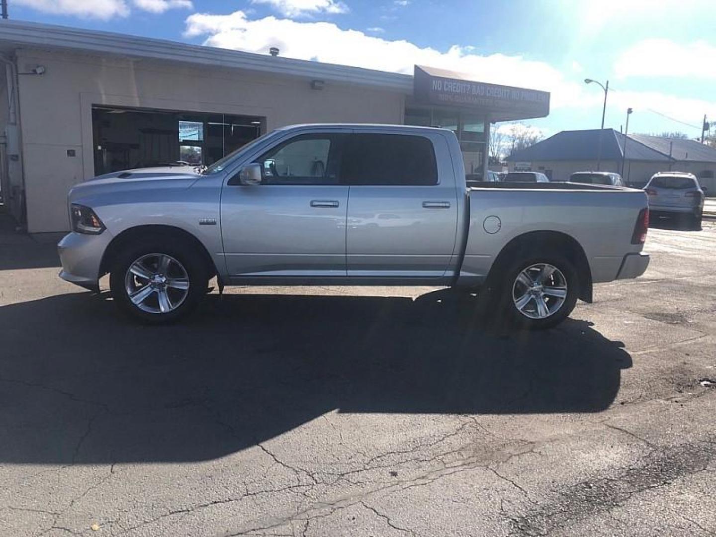 2015 SILVER /BLACK RAM 1500 Sport Crew Cab SWB 4WD (1C6RR7MT9FS) with an 5.7L V8 OHV 16V engine, 6-Speed Automatic transmission, located at 3304 Woodville Road, Northwood, OH, 43619, (419) 210-8019, 41.612694, -83.480743 - Your #1 Destination for Auto Loans and mdash;No Matter Your Credit!At our dealership, we cater to everyone and mdash;whether you have good, bad, or no credit. With hundreds of vehicles to choose from, you can easily find the perfect car, truck, or SUV that fits your needs.Get Approved Today!Visit ou - Photo#1