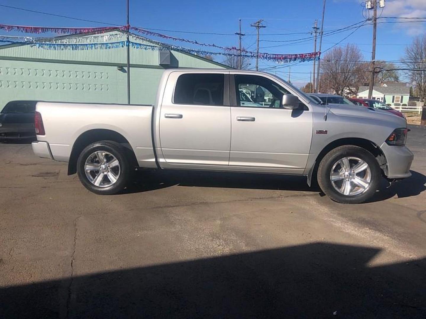 2015 SILVER /BLACK RAM 1500 Sport Crew Cab SWB 4WD (1C6RR7MT9FS) with an 5.7L V8 OHV 16V engine, 6-Speed Automatic transmission, located at 3304 Woodville Road, Northwood, OH, 43619, (419) 210-8019, 41.612694, -83.480743 - Your #1 Destination for Auto Loans and mdash;No Matter Your Credit!At our dealership, we cater to everyone and mdash;whether you have good, bad, or no credit. With hundreds of vehicles to choose from, you can easily find the perfect car, truck, or SUV that fits your needs.Get Approved Today!Visit ou - Photo#5