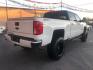 2017 WHITE /BLACK Chevrolet Silverado 1500 LTZ Crew Cab Long Box 4WD (3GCUKSECXHG) with an 5.3L V8 OHV 16V engine, 6A transmission, located at 3304 Woodville Road, Northwood, OH, 43619, (419) 210-8019, 41.612694, -83.480743 - Your #1 Destination for Auto Loans and mdash;No Matter Your Credit!At our dealership, we cater to everyone and mdash;whether you have good, bad, or no credit. With hundreds of vehicles to choose from, you can easily find the perfect car, truck, or SUV that fits your needs.Get Approved Today!Visit ou - Photo#4