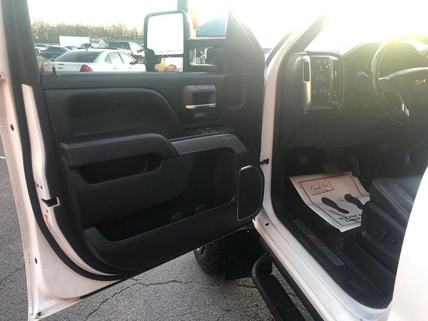 2017 WHITE /BLACK Chevrolet Silverado 1500 LTZ Crew Cab Long Box 4WD (3GCUKSECXHG) with an 5.3L V8 OHV 16V engine, 6A transmission, located at 3304 Woodville Road, Northwood, OH, 43619, (419) 210-8019, 41.612694, -83.480743 - Your #1 Destination for Auto Loans and mdash;No Matter Your Credit!At our dealership, we cater to everyone and mdash;whether you have good, bad, or no credit. With hundreds of vehicles to choose from, you can easily find the perfect car, truck, or SUV that fits your needs.Get Approved Today!Visit ou - Photo#8