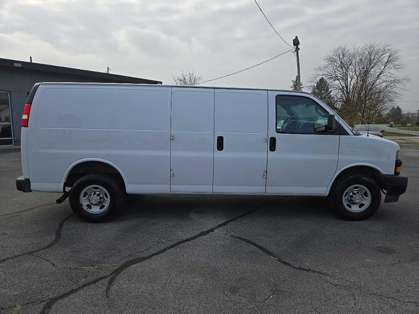 2021 WHITE /TAN Chevrolet Express 2500 Cargo Extended (1GCWGBF70M1) with an 6.6L V8 OHV 16V engine, 6A transmission, located at 3304 Woodville Road, Northwood, OH, 43619, (419) 210-8019, 41.612694, -83.480743 - Your #1 Destination for Auto Loans and mdash;No Matter Your Credit!At our dealership, we cater to everyone and mdash;whether you have good, bad, or no credit. With hundreds of vehicles to choose from, you can easily find the perfect car, truck, or SUV that fits your needs.Get Approved Today!Visit ou - Photo#5