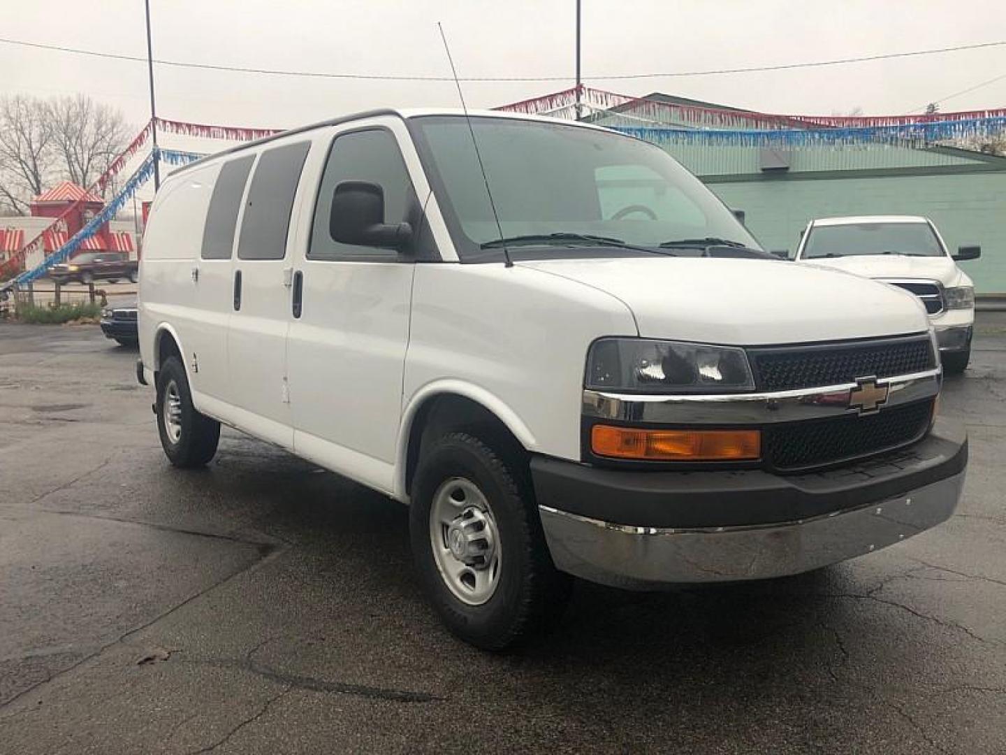 2014 WHITE /TAN Chevrolet Express 2500 Cargo (1GCWGFFA0E1) with an 4.8L V8 OHV 16V engine, 6-Speed Automatic transmission, located at 3304 Woodville Road, Northwood, OH, 43619, (419) 210-8019, 41.612694, -83.480743 - Your #1 Destination for Auto Loans and mdash;No Matter Your Credit!At our dealership, we cater to everyone and mdash;whether you have good, bad, or no credit. With hundreds of vehicles to choose from, you can easily find the perfect car, truck, or SUV that fits your needs.Get Approved Today!Visit ou - Photo#6