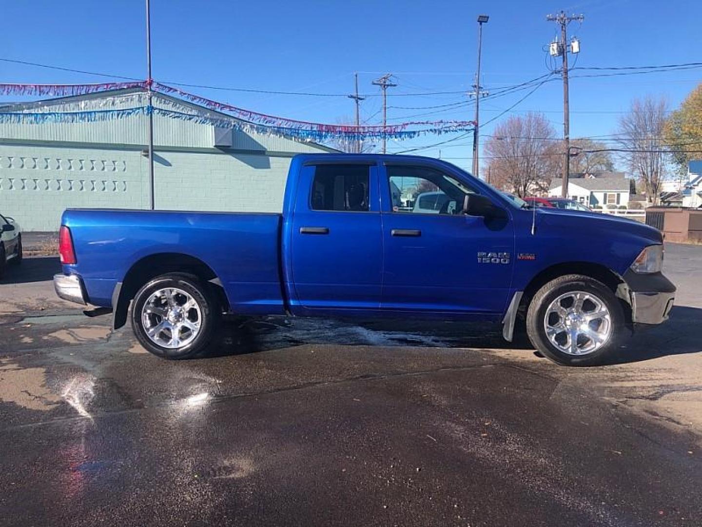 2016 BLUE /GFREY RAM 1500 Tradesman Quad Cab 4WD (1C6RR7FTXGS) with an 5.7L V8 OHV 16V engine, 6A transmission, located at 3304 Woodville Road, Northwood, OH, 43619, (419) 210-8019, 41.612694, -83.480743 - Your #1 Destination for Auto Loans and mdash;No Matter Your Credit!At our dealership, we cater to everyone and mdash;whether you have good, bad, or no credit. With hundreds of vehicles to choose from, you can easily find the perfect car, truck, or SUV that fits your needs.Get Approved Today!Visit ou - Photo#5