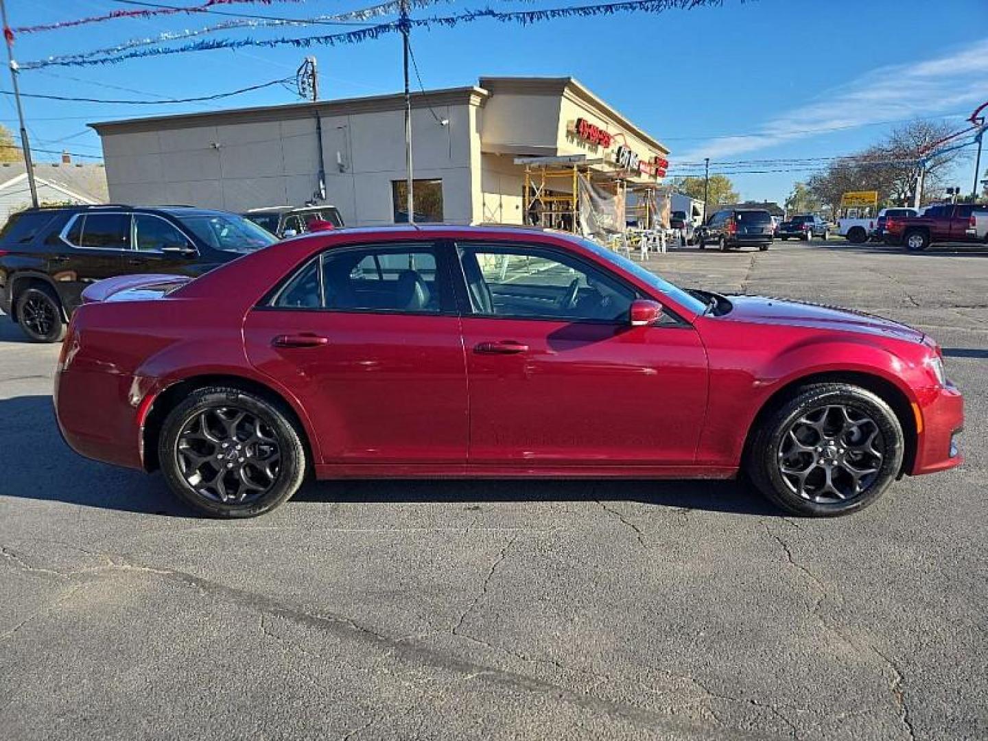 2021 MAROON /BLACK Chrysler 300 S V6 AWD (2C3CCAGG7MH) with an 3.6L V6 DOHC 24V engine, 8A transmission, located at 3304 Woodville Road, Northwood, OH, 43619, (419) 210-8019, 41.612694, -83.480743 - Your #1 Destination for Auto Loans and mdash;No Matter Your Credit!At our dealership, we believe everyone deserves the opportunity to drive their dream car and mdash;whether you have good credit, bad credit, or no credit at all. With a wide selection of hundreds of cars, trucks, and SUVs, you'll fin - Photo#5