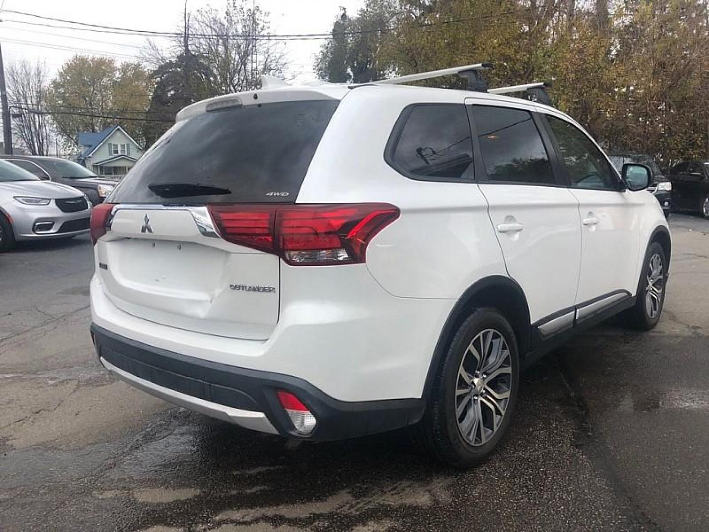 2018 WHITE /BLACK Mitsubishi Outlander SEL AWD (JA4AZ3A35JZ) with an 2.4L L4 DOHC 16V engine, CVT transmission, located at 3304 Woodville Road, Northwood, OH, 43619, (419) 210-8019, 41.612694, -83.480743 - Your #1 Destination for Auto Loans and mdash;No Matter Your Credit!At our dealership, we cater to everyone and mdash;whether you have good, bad, or no credit. With hundreds of vehicles to choose from, you can easily find the perfect car, truck, or SUV that fits your needs.Get Approved Today!Visit ou - Photo#4